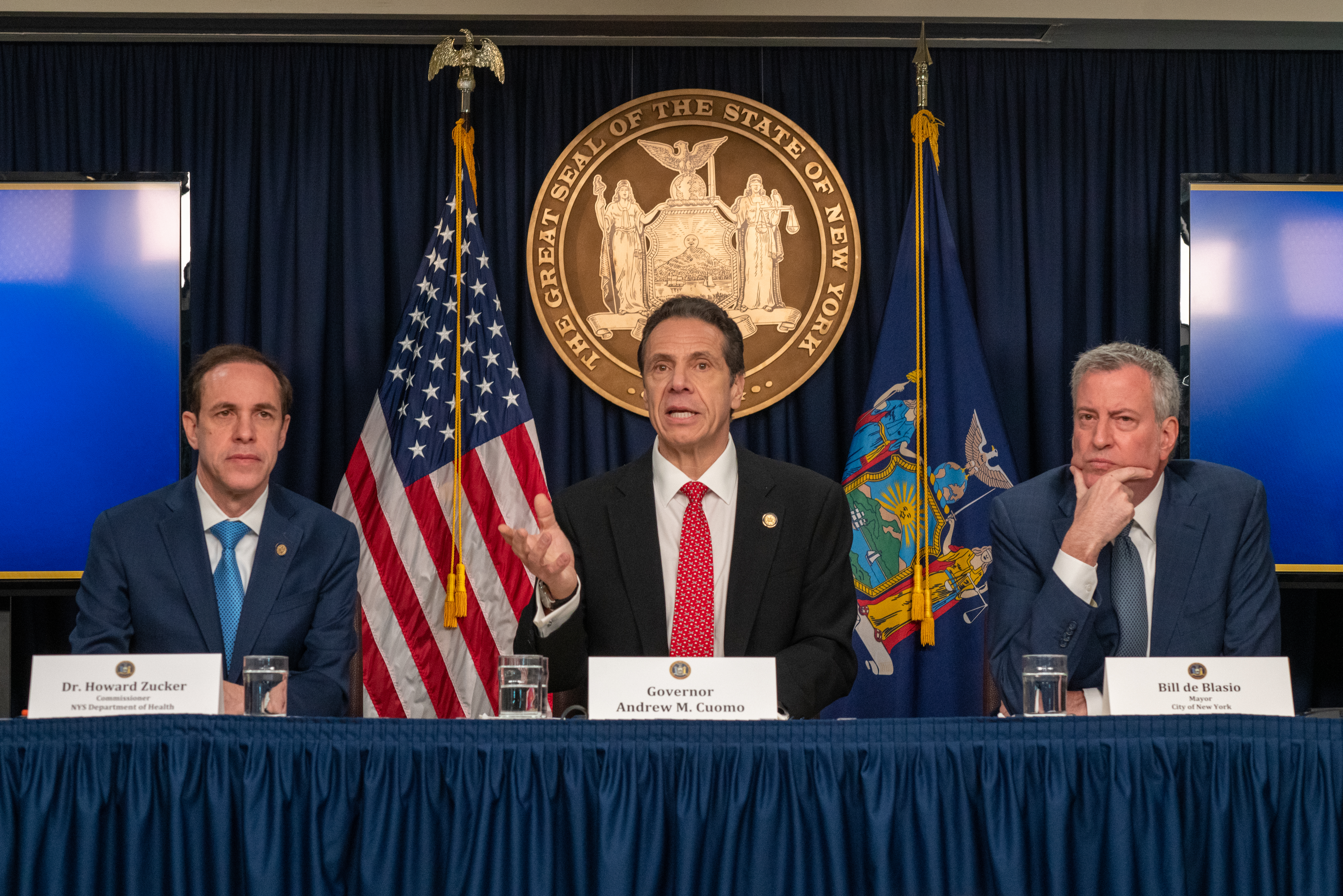 NEW YORK, NY - MARCH 2: New York state Gov. Andrew Cuomo (C), New York City Mayor Bill DeBlasio (R) and New York state Department of Health Commissioner Howard Zucker hold a news conference on the first confirmed case of COVID-19 in New York on March 2, 2020 in New York City. A female health worker in her 30s who had traveled in Iran contracted the virus and is now isolated at home with symptoms of COVID-19, but is not in serious condition. Cuomo said in a statement that the patient "has been in a controlled situation since arriving to New York." (Photo by David Dee Delgado/Getty Images)
