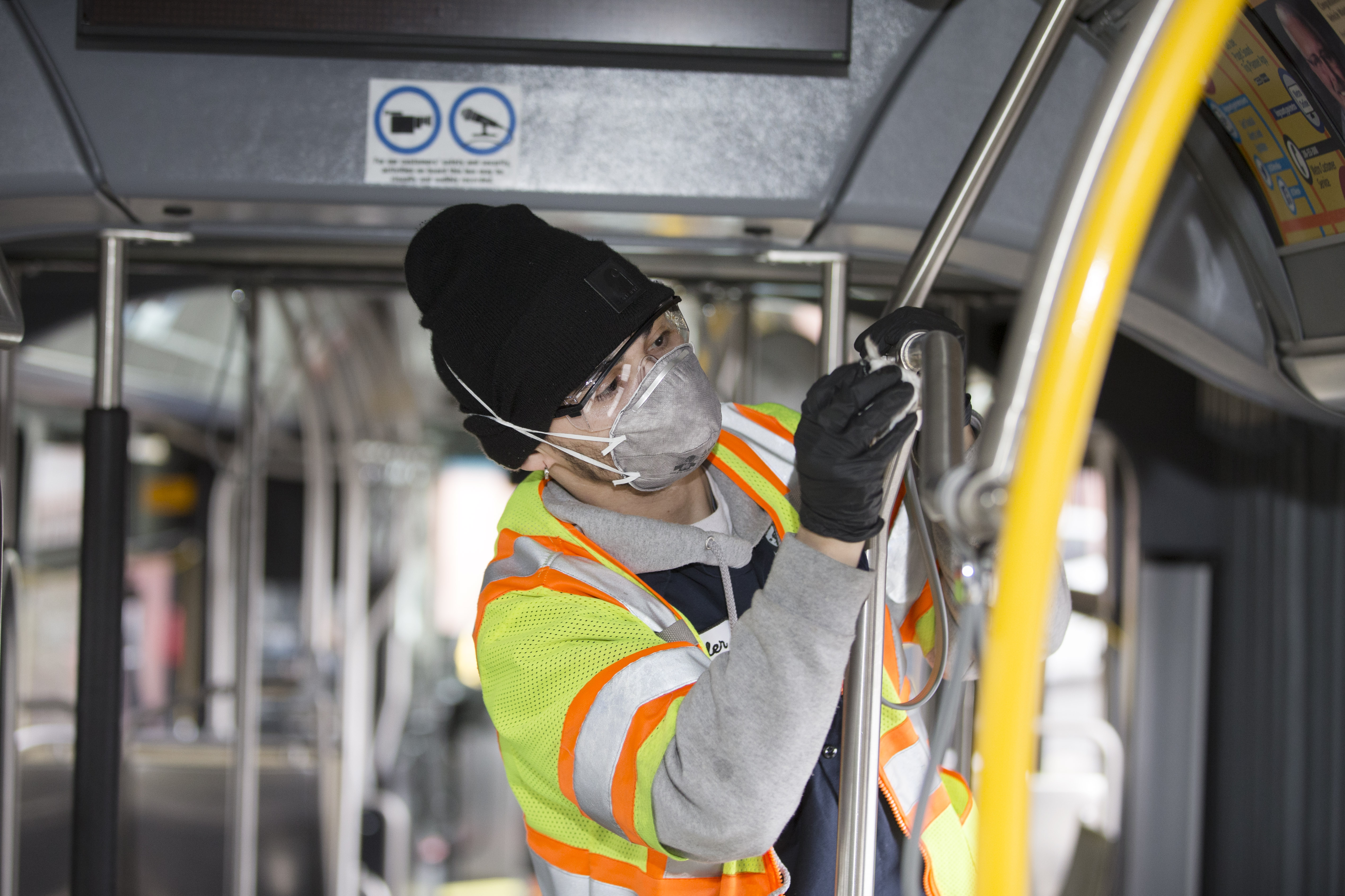 SEATTLE, WA - MARCH 03: A utility service worker deep cleans a bus as part of its usual cleaning routine at the King County Metro Atlantic/Central operating base on March 3, 2020 in Seattle, Washington. (Photo by Karen Ducey/Getty Images)