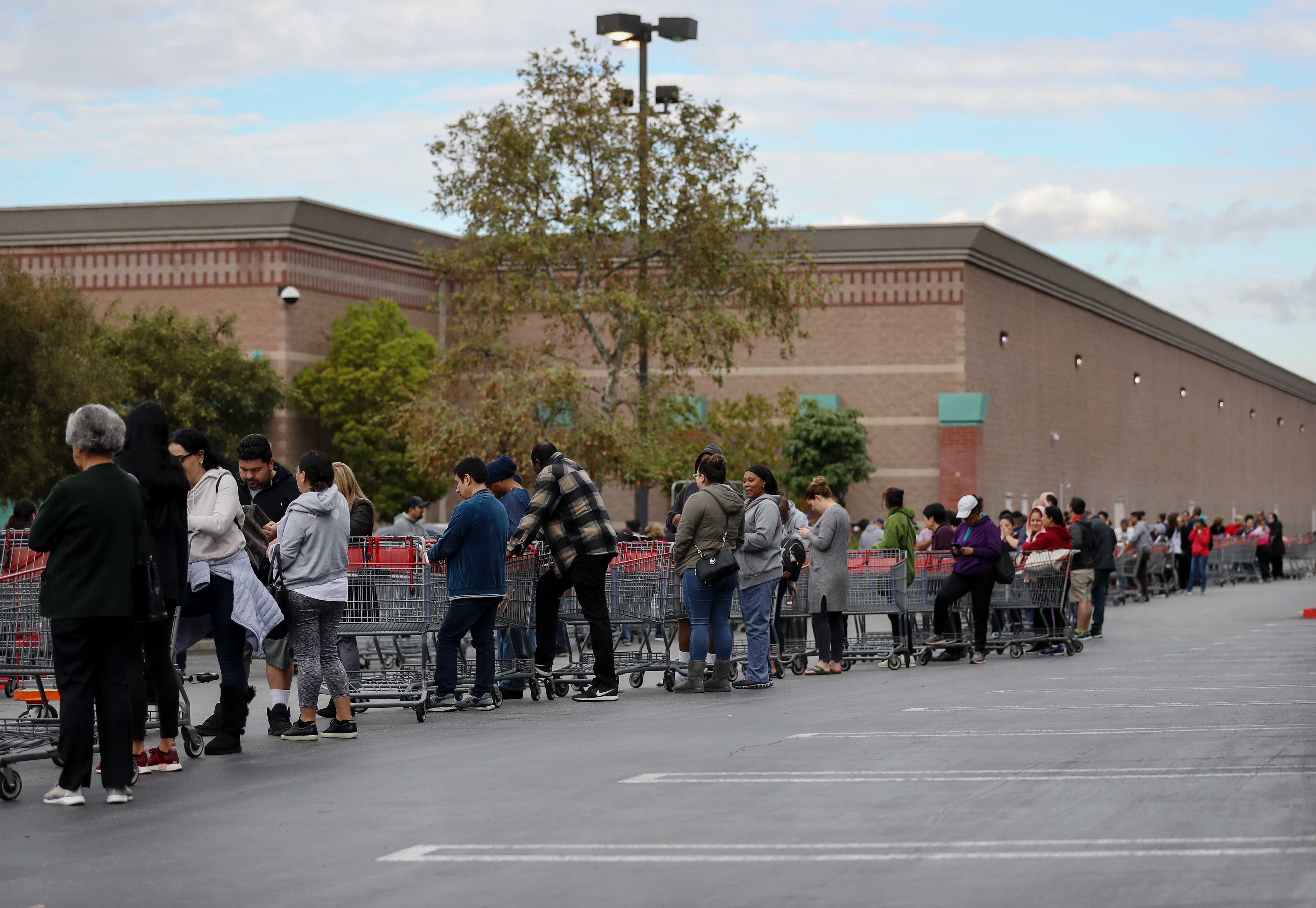 People wait in line to enter a Costco Wholesale store before it opened in the morning on March 12, 2020 in Glendale, California. (Mario Tama/Getty Images)