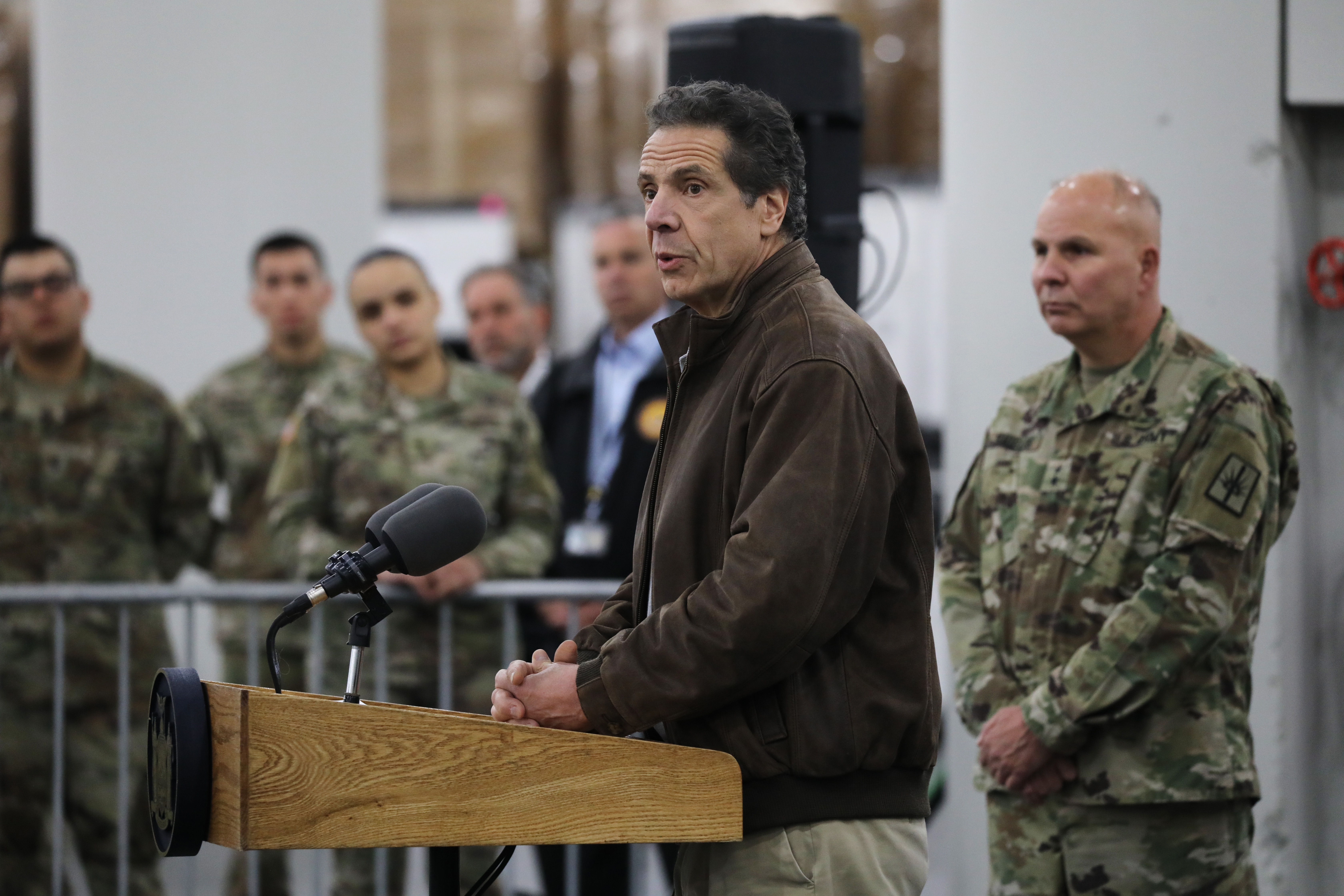 NEW YORK, NEW YORK - MARCH 23: New York Governor Andrew Cuomo speaks to the media and members of the National Guard at the Javits Convention Center which is being turned into a hospital to help fight coronavirus cases on March 23, 2020 in New York City. The plan is part of his New York state request for assistance to the federal government for four field hospital sites and aid from the U.S. Army Corps of Engineers. New York has been one of the hardest hit states in the nation with over 10,000 cases of COVID-19. (Photo by Spencer Platt/Getty Images)
