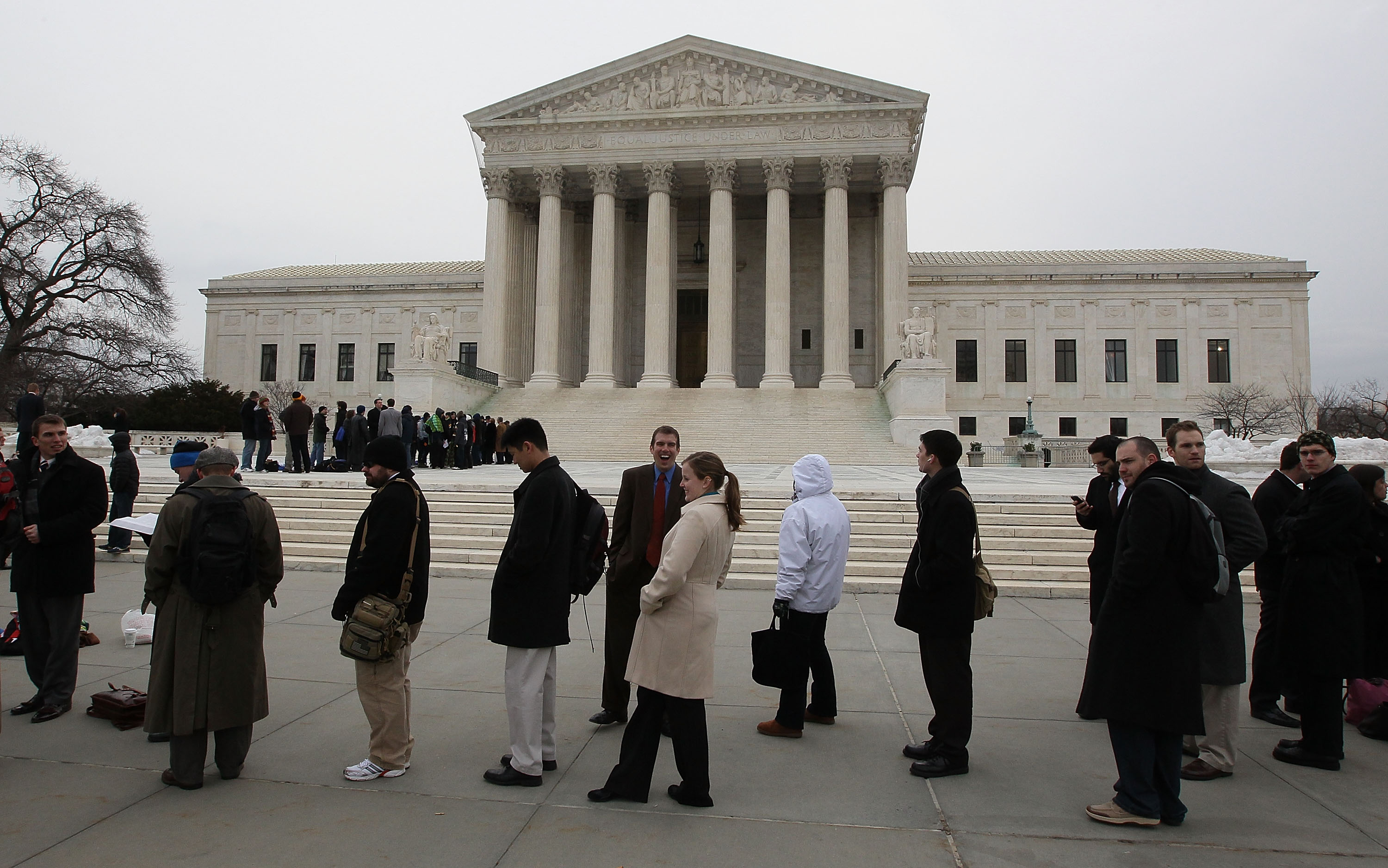 People wait in line to tour the U.S. Supreme Court Building on March 2, 2010 in Washington, DC. The high court heard arguments in the case of McDonald v the City of Chicago case that questions whether the Second Amendment is incorporated into the due process clause or the privileges or immunities clause of the fourteenth amendment, thus invalidating the city's handgun ban. (Mark Wilson/Getty Images)