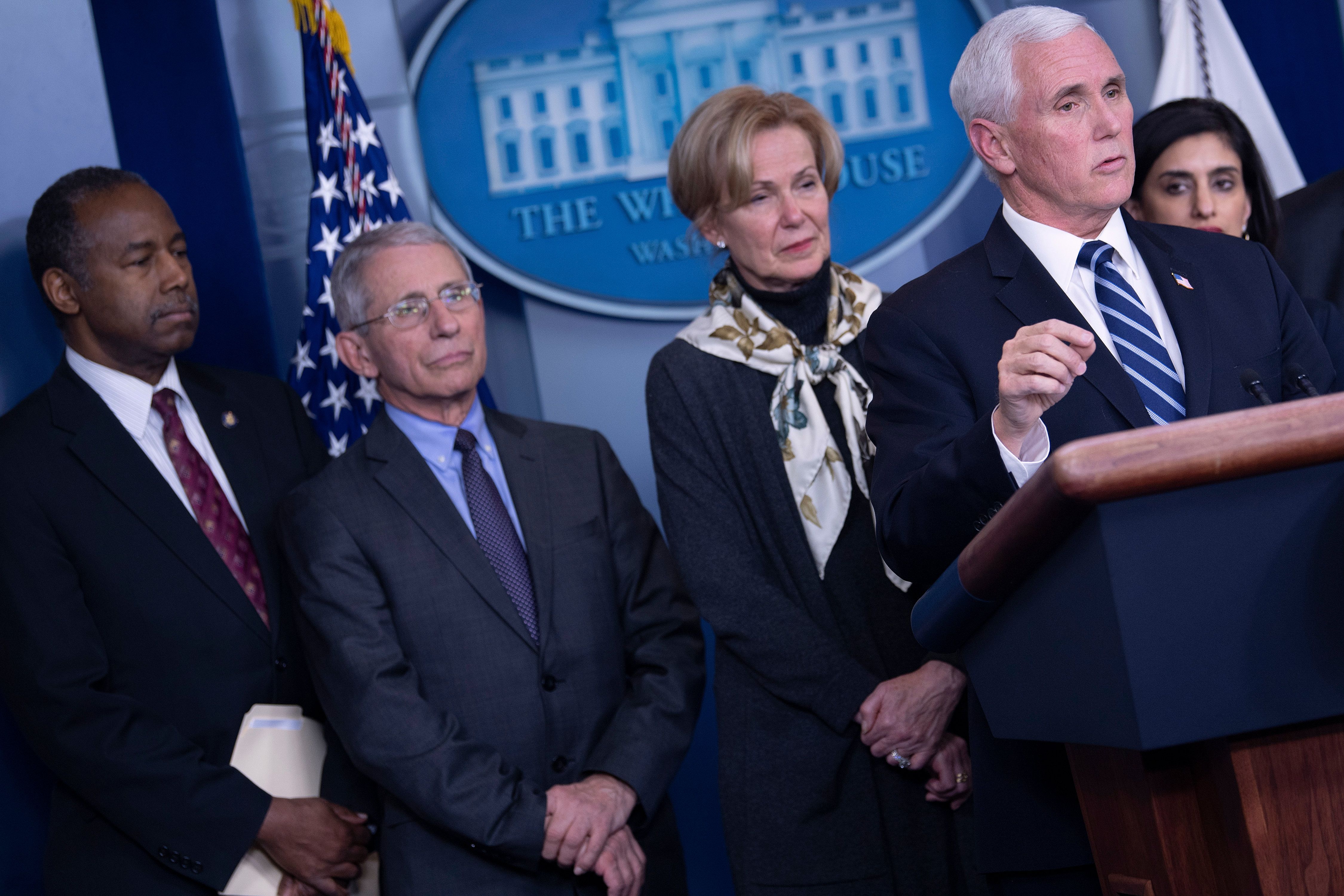 US Vice President Mike Pence, flanked by (from L) HUD Secretary Ben Carson, Dr. Anthony Fauci, Coronavirus response coordinator Dr. Deborah Birx and CMS Administrator Seema Verma, speaks during a briefing about COVID-19 at the White House March 4, 2020, in Washington, DC. (Photo by BRENDAN SMIALOWSKI/AFP via Getty Images)