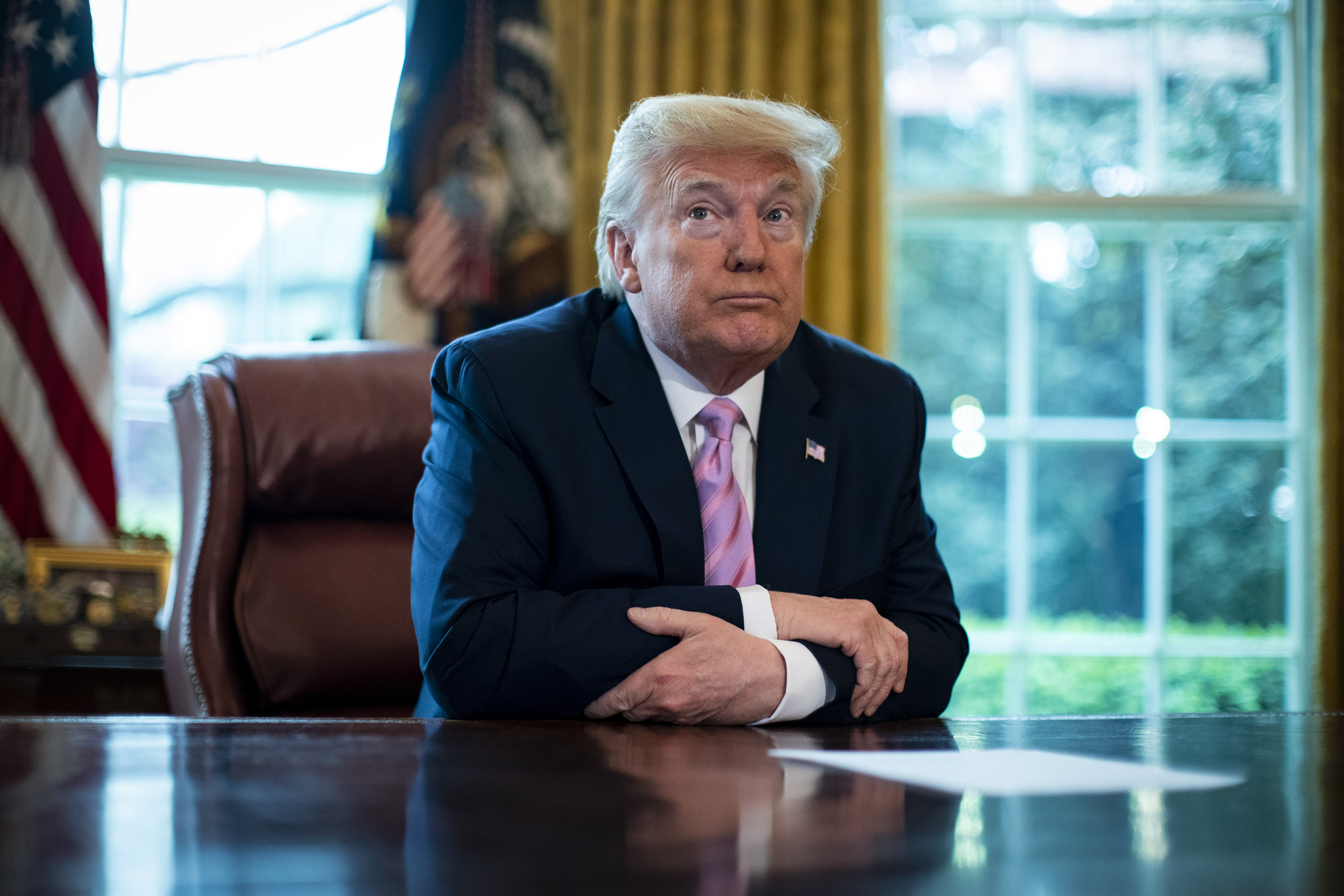 WASHINGTON, DC - APRIL 10: President Donald Trump pauses following speaking during a Easter blessing in the Oval Office of the White House on April 10, 2020 in Washington, DC.The Trump adminstration is stressing the need for physical distancing over the Easter weekend. (Photo by Al Drago - Pool/Getty Images)
