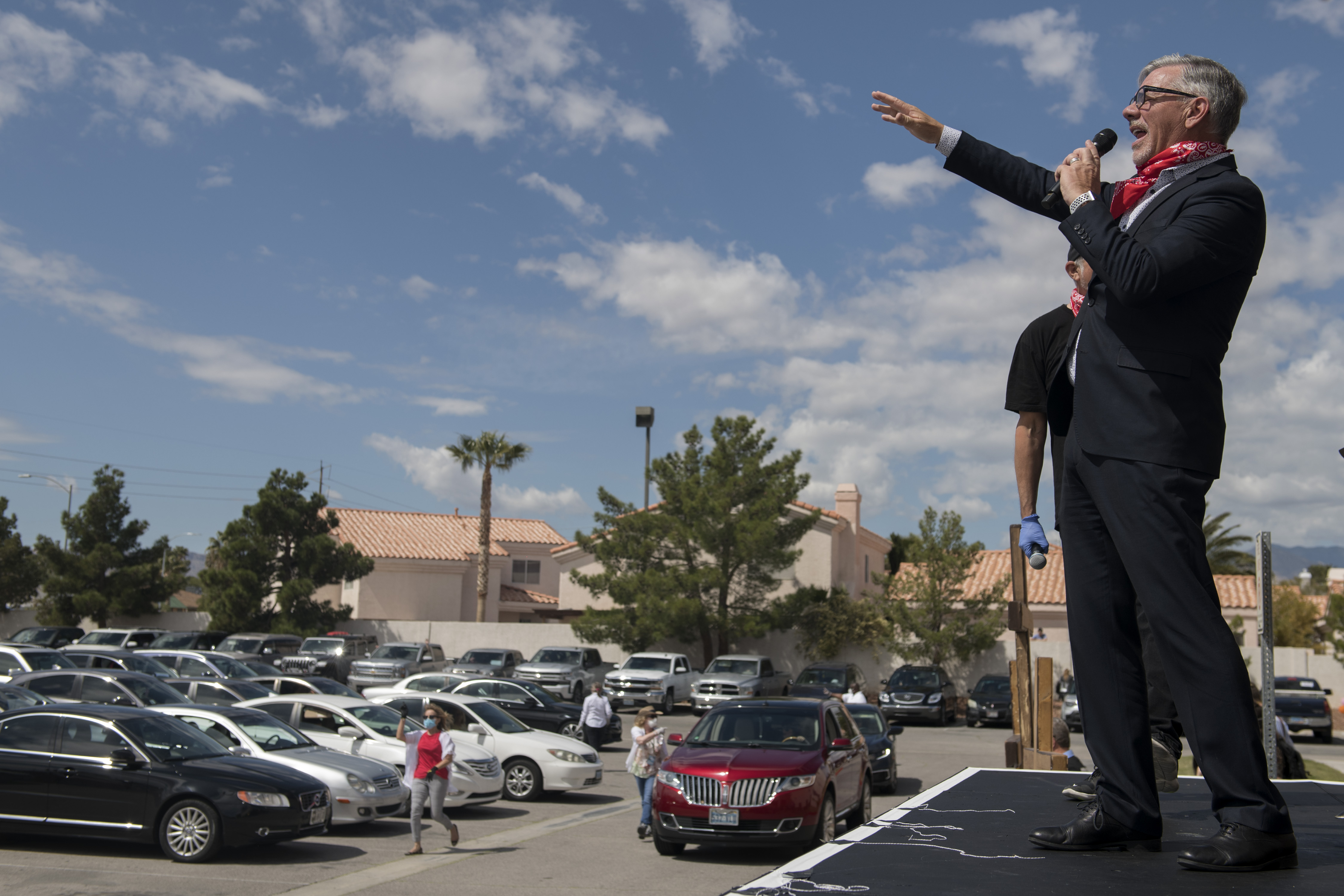 Pastor Paul Goulet leads a drive-in Easter service amid the Coronavirus pandemic at the International Church of Las Vegas in Las Vegas, Nevada on Sunday, April 12, 2020. - (Photo by BRIDGET BENNETT/AFP via Getty Images)