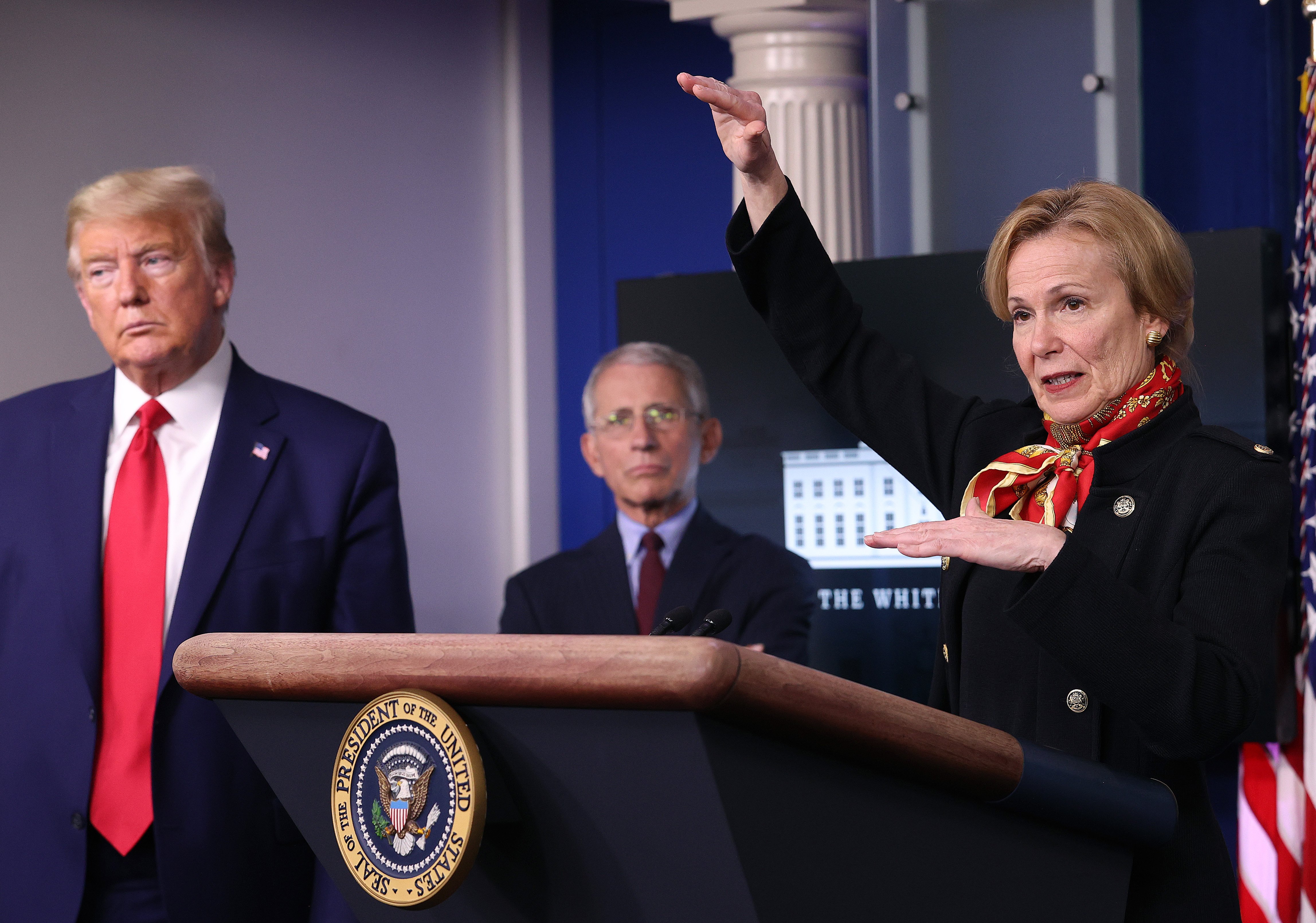 WASHINGTON, DC - MARCH 31: White House coronavirus response coordinator Debbie Birx speaks while flanked by President Donald Trump (L), and Dr. Anthony Fauci (C), director of the National Institute of Allergy and Infectious Diseases, during the daily coronavirus task force briefing in the Brady Briefing room at the White House on March 31, 2020 in Washington, DC. With the nationwide death toll rising due to the coronavirus, the United States has extended its social distancing practices through the end of April, while many states have issued stay-at-home orders that strongly discourage residents from leaving home unless absolutely necessary or essential. (Photo by Win McNamee/Getty Images)