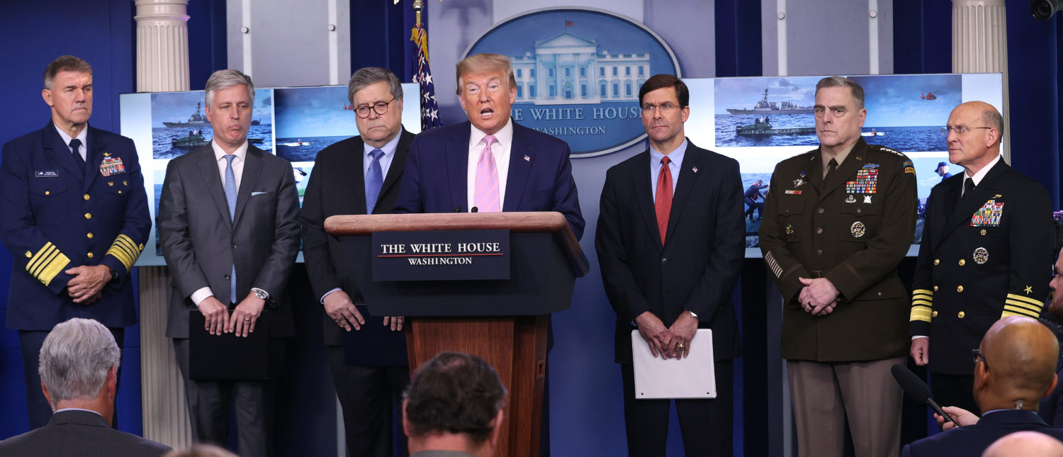 WASHINGTON, DC - APRIL 01: U.S. President Donald Trump speaks at the press briefing room flanked Attorney General William Barr (3rd L), Defense Secretary Mark Esper (3rd R), Chairman of the Joint Chiefs of Staff Gen. Mark Milley (2nd R), National Security Advisor Robert O'Brien (2nd L) and Chief of Naval Operations Admiral Michael Gilday (R) April 1, 2020 in Washington, DC. After announcing yesterday that COVID-19 could kill between 100,000 and 240,000 Americans, the Trump administration is also contending with the economic effects of the outbreak as the stock market continues to fall, businesses remain closed, and companies lay off and furlough employees. (Photo by Win McNamee/Getty Images)