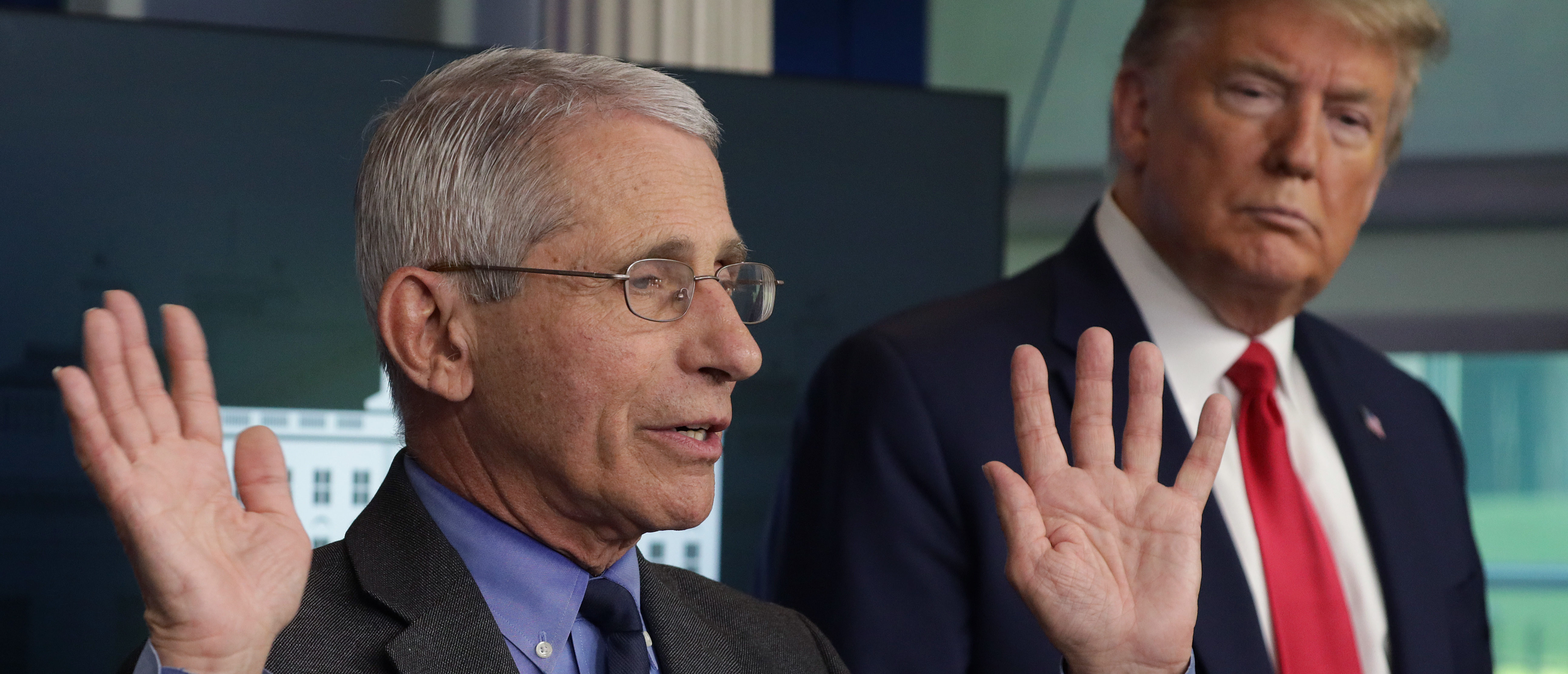WASHINGTON, DC - APRIL 13: Dr. Anthony Fauci, director of the National Institute of Allergy and Infectious Diseases speaks as President Donald Trump listens during the daily briefing of the White House Coronavirus Task Force at the James Brady Press Briefing Room of the White House April 13, 2020 in Washington, DC. On Monday President Trump tweeted that he will be the one to make the decision to re-open the states in conjunction with the Governors and input from others. (Photo by Alex Wong/Getty Images)
