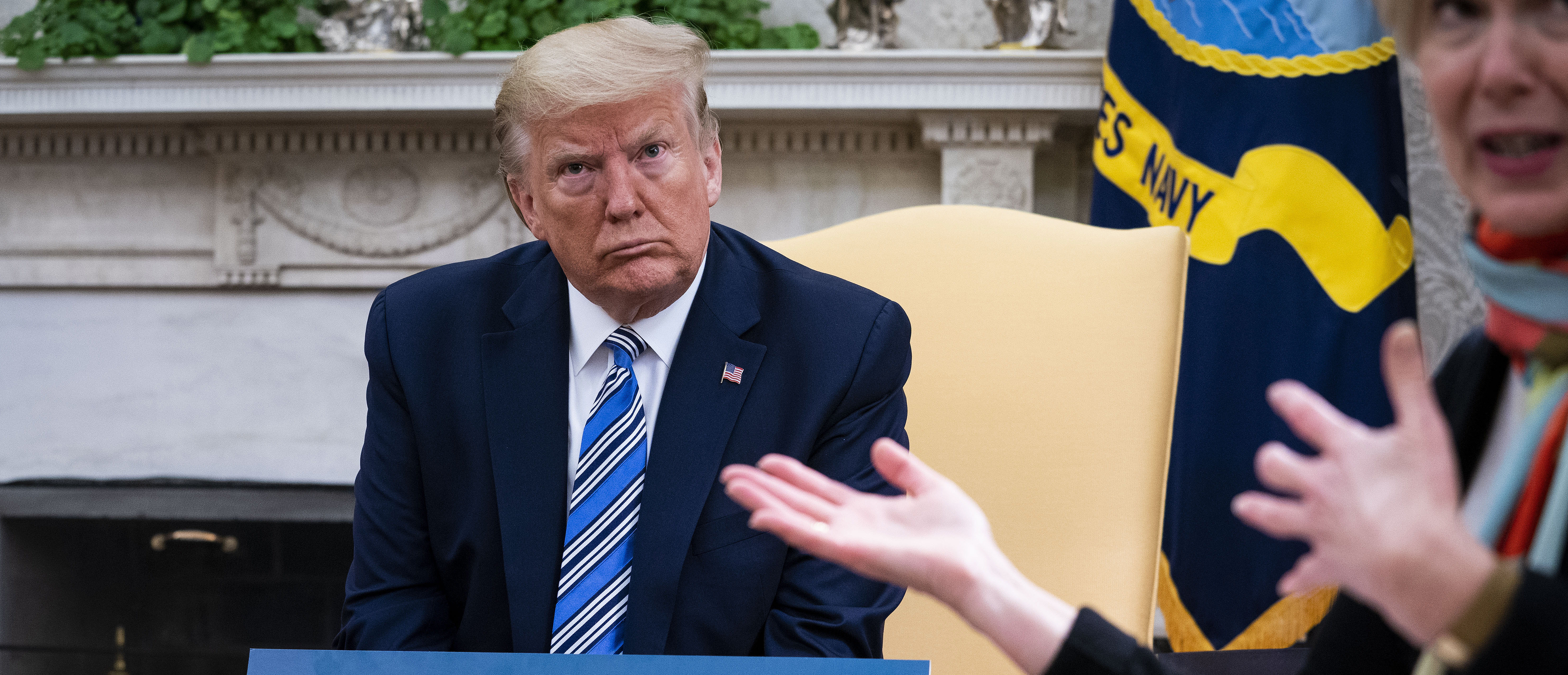 White House Coronavirus Task Force Coordinator Deborah Birx (R) answers a question while meeting with Florida Gov. Ron DeSantis and U.S. President Donald Trump in the Oval Office of the White House on April 28, 2020 in Washington, DC. (Doug Mills/The New York Times/Pool/Getty Images)