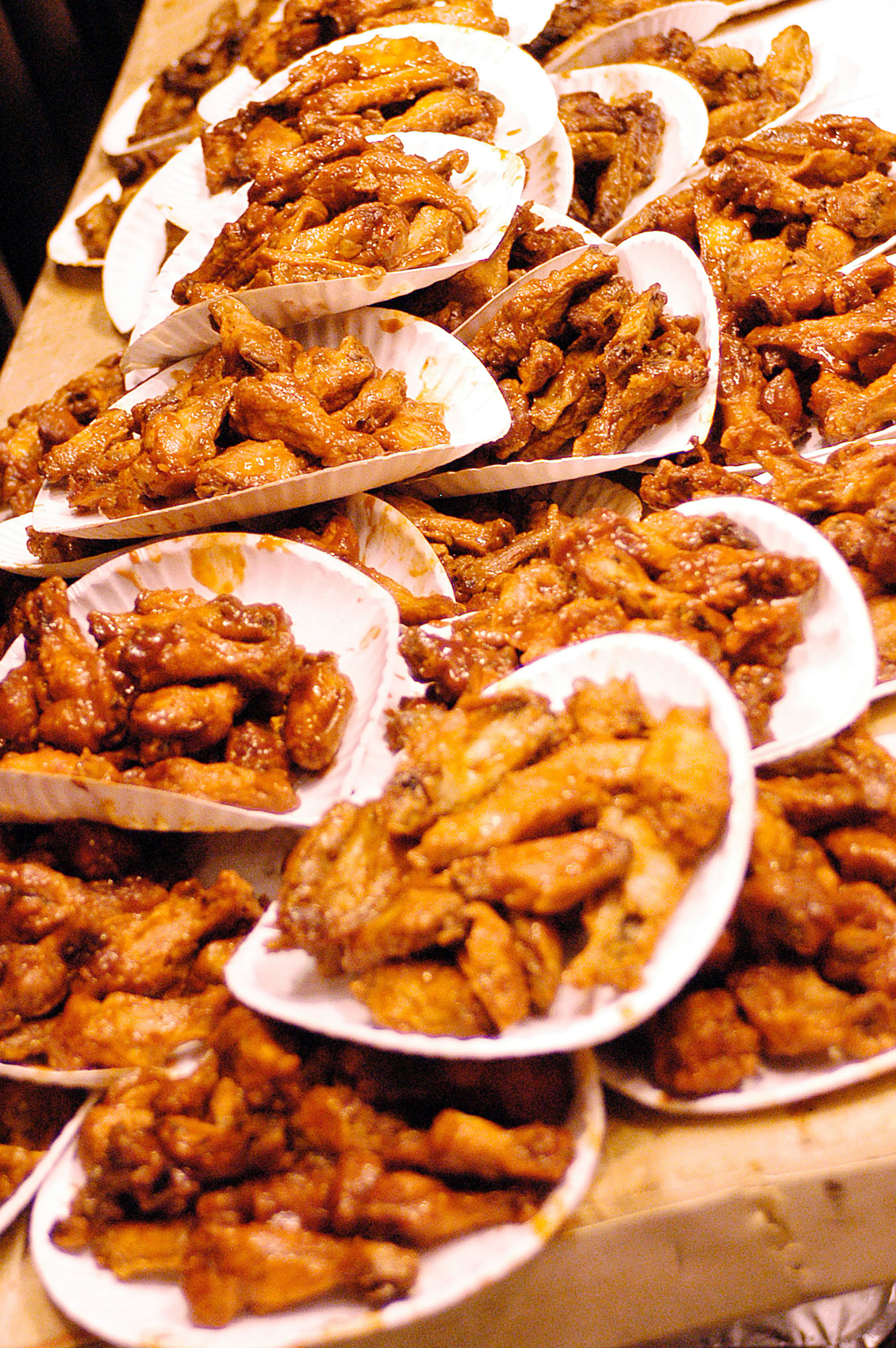 Buffalo Wings are stacked up before the competition begins at the 12th Annual Wing Bowl on January 30, 2004 in Philadelphia. (Photo by Jeff Fusco/Getty Images)