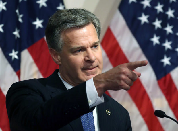 WASHINGTON, DC - JUNE 14: FBI Director is Christopher A. Wray speaks to the media during a news conference at FBI Headquarters, on June 14, 2018 in Washington, DC. Earlier today the inspector general released a 500 page report on the Clinton email investigation. (Photo by Mark Wilson/Getty Images)