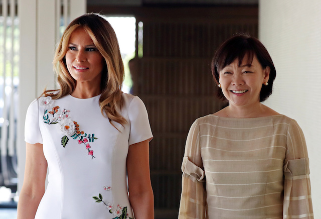 U.S. first lady Melania Trump and Akie Abe, wife of Japanese Prime Minister Shinzo Abe, smile while walking together at Akasaka State Guest House in Tokyo, Japan May 27, 2019. REUTERS/Athit Perawongmetha 