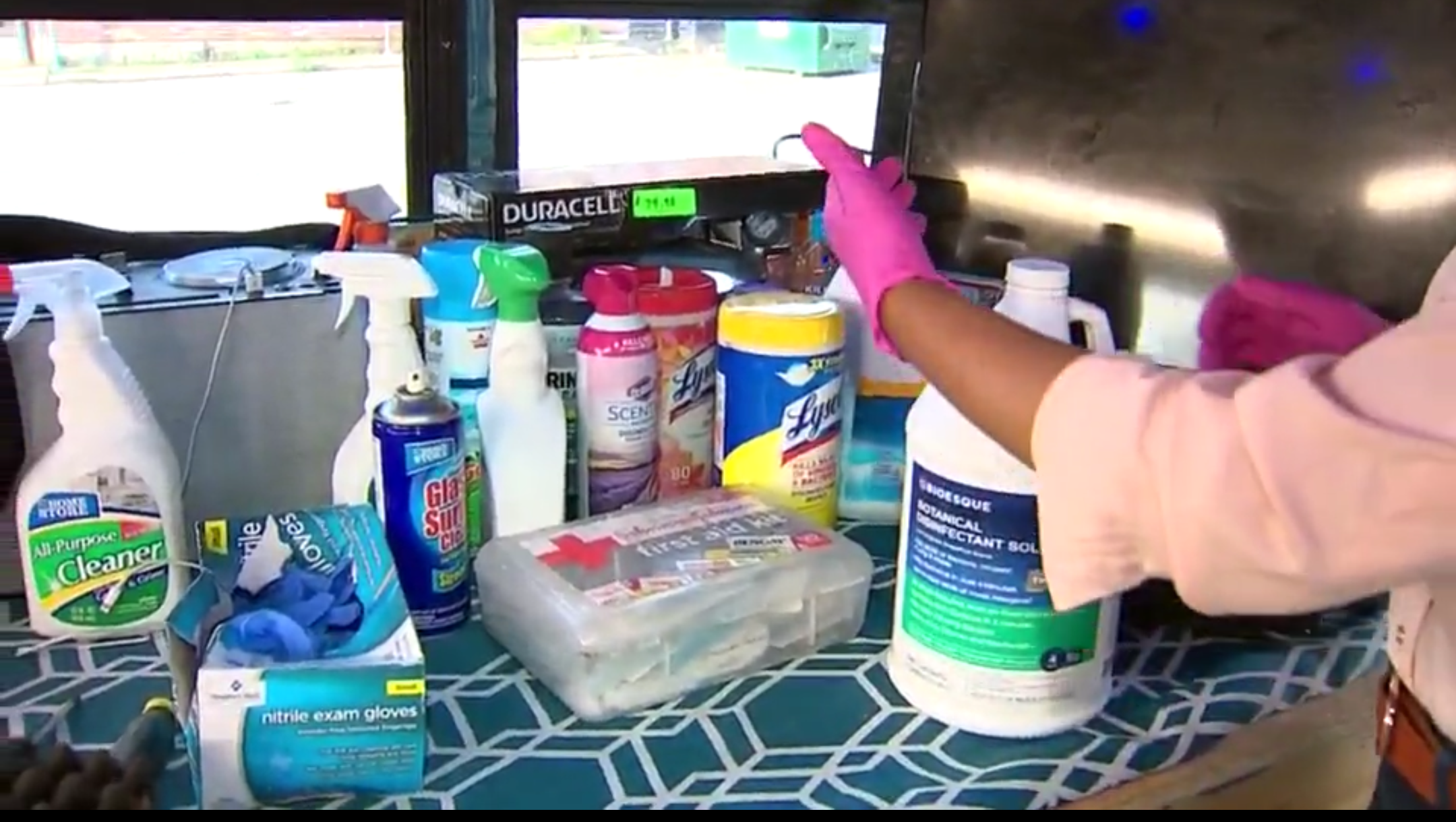 Earl Baldwin’s disinfectant supplies in his mobile barber shop. (Screenshot/WPXI)