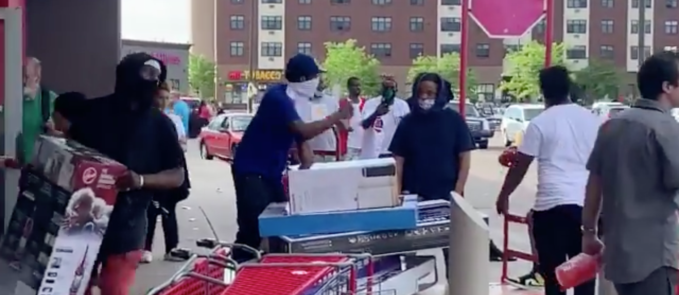 Minneapolis Police Protesters Seen Looting TVs, Clothes From ...