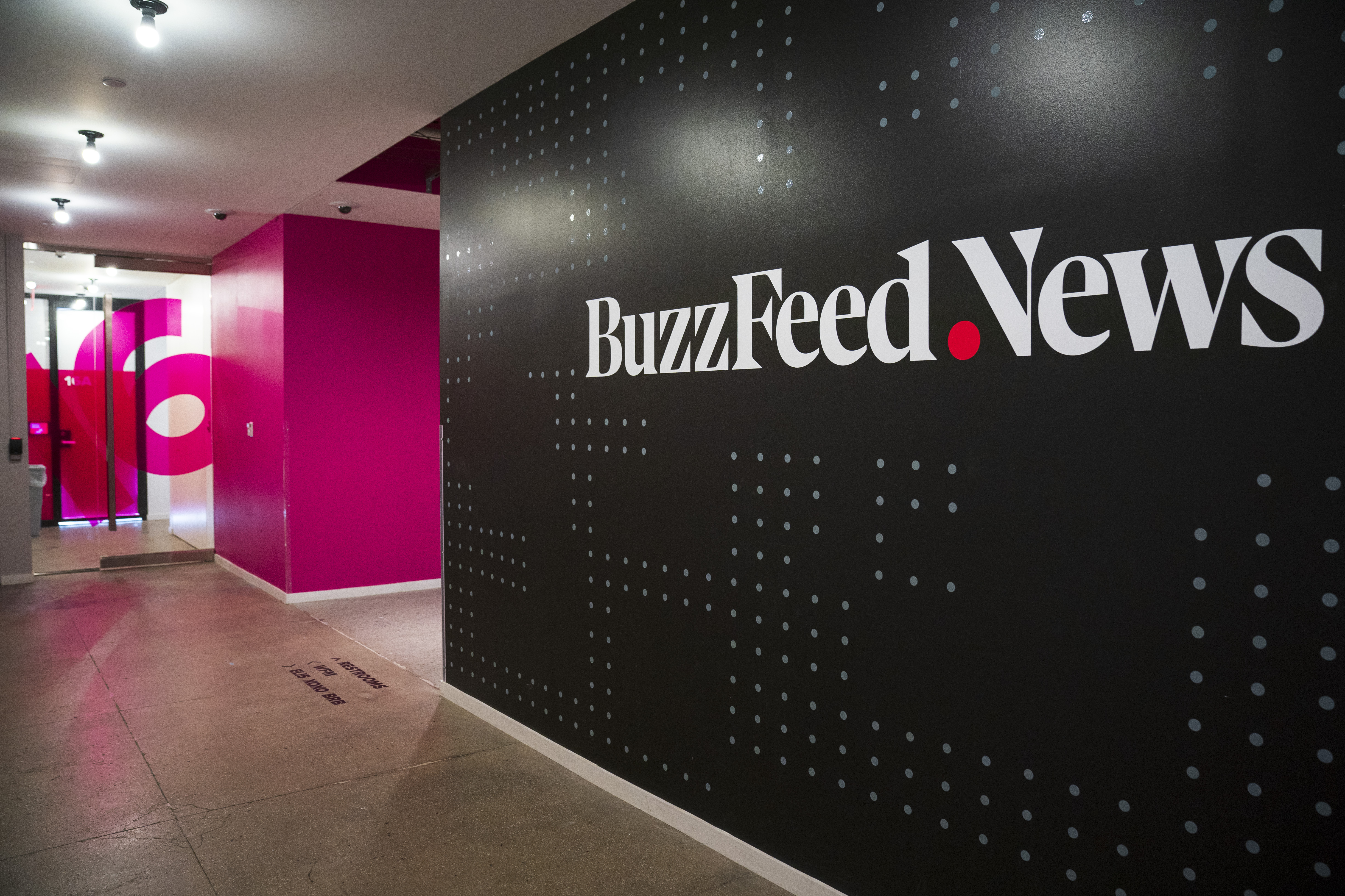 A BuzzFeed News logo adorns a wall inside BuzzFeed headquarters, December 11, 2018 in New York City. (Drew Angerer/Getty Images)