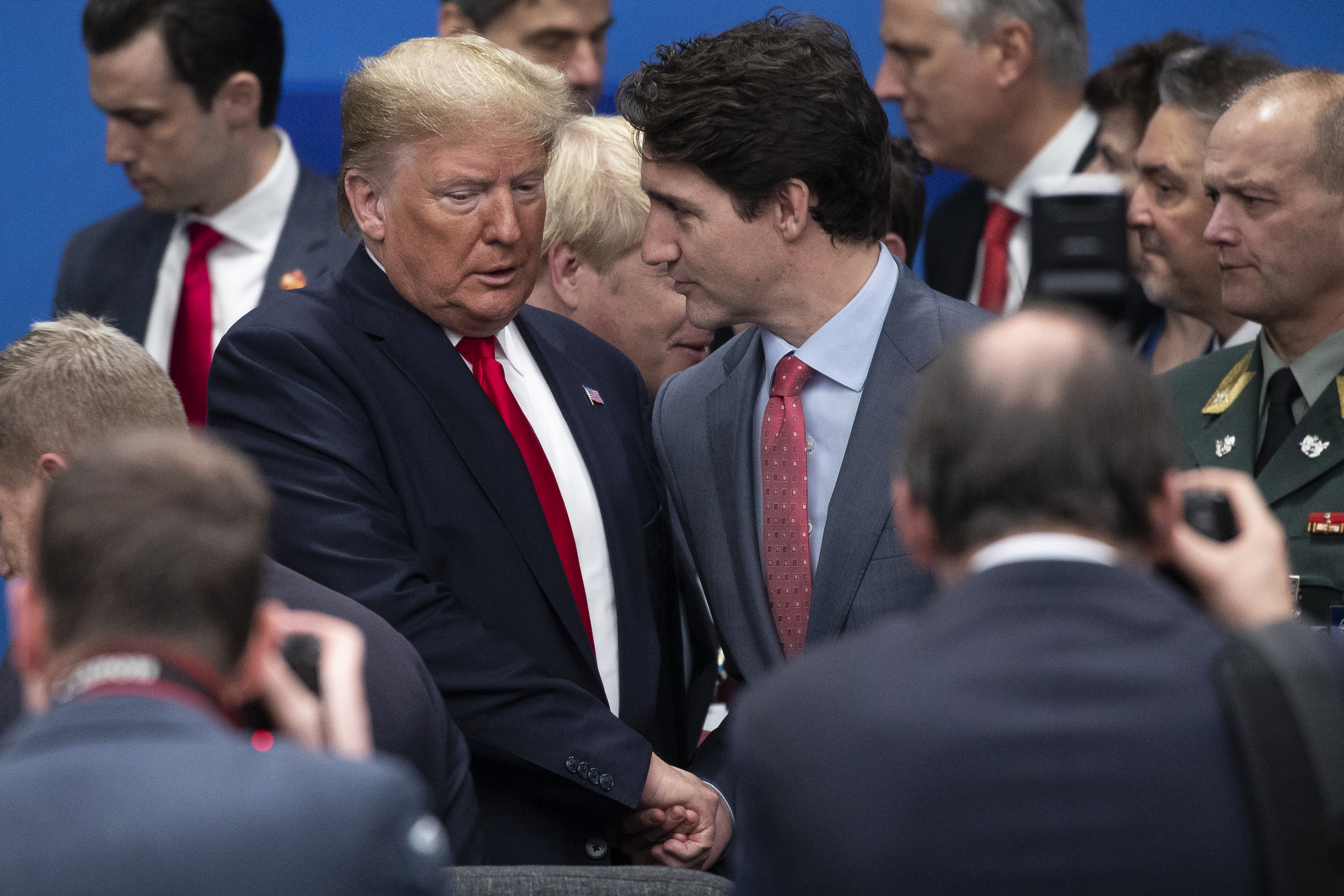 HERTFORD, ENGLAND - DECEMBER 04: U.S. President Donald Trump (L) ad Canadian Prime Minister Justin Trudeau (R) attend the NATO summit at the Grove Hotel on December 4, 2019 in Watford, England. France and the UK signed the Treaty of Dunkirk in 1947 in the aftermath of WW2 cementing a mutual alliance in the event of an attack by Germany or the Soviet Union. The Benelux countries joined the Treaty and in April 1949 expanded further to include North America and Canada followed by Portugal, Italy, Norway, Denmark and Iceland. This new military alliance became the North Atlantic Treaty Organisation (NATO). The organisation grew with Greece and Turkey becoming members and a re-armed West Germany was permitted in 1955. This encouraged the creation of the Soviet-led Warsaw Pact delineating the two sides of the Cold War. This year marks the 70th anniversary of NATO. (Photo by Dan Kitwood/Getty Images)