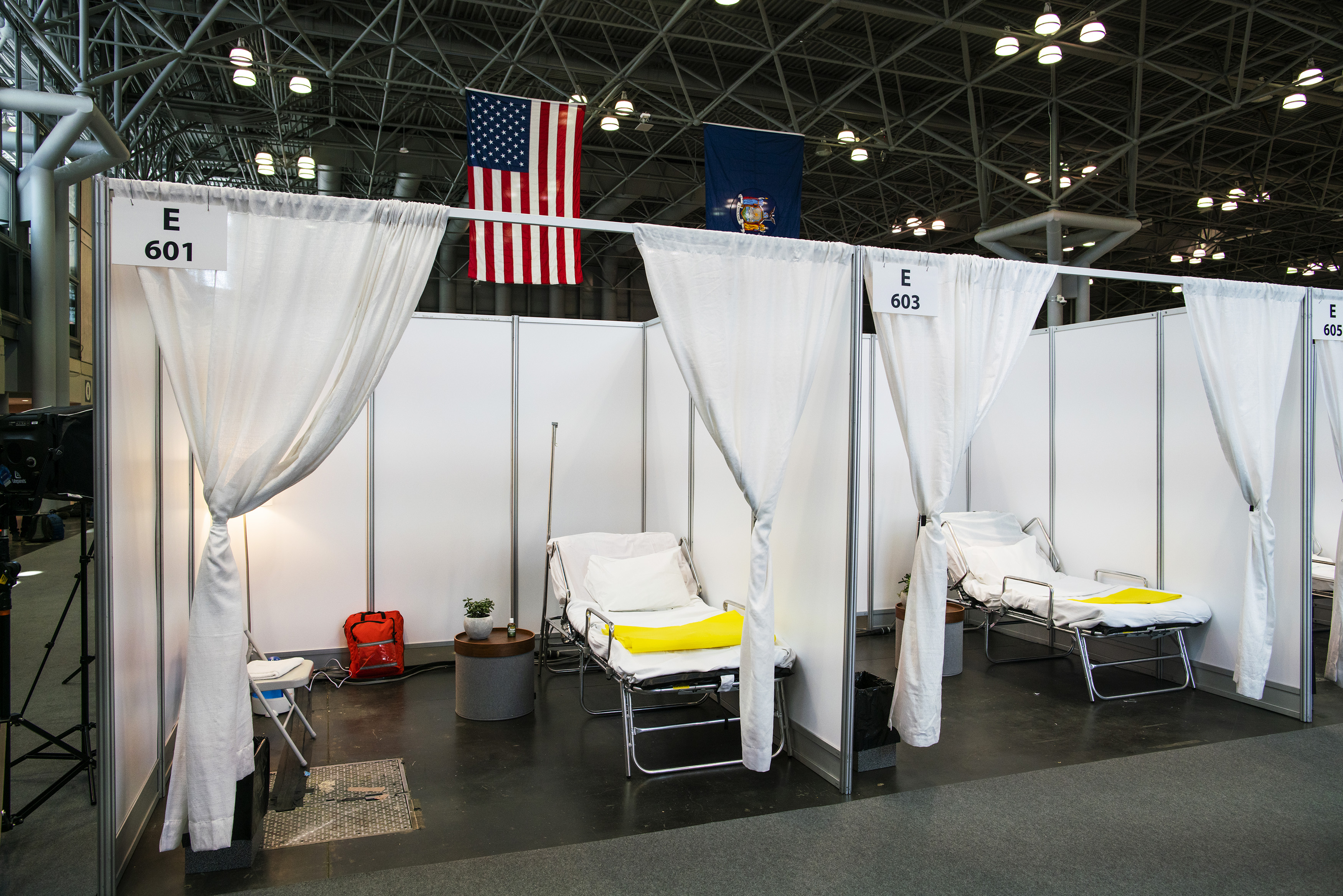 Hospital bed booths are set up at the Jacob K. Javits Convention Center which is being turned into a hospital to help fight coronavirus cases on March 27, 2020 in New York City. (Photo by Eduardo Munoz Alvarez/Getty Images)