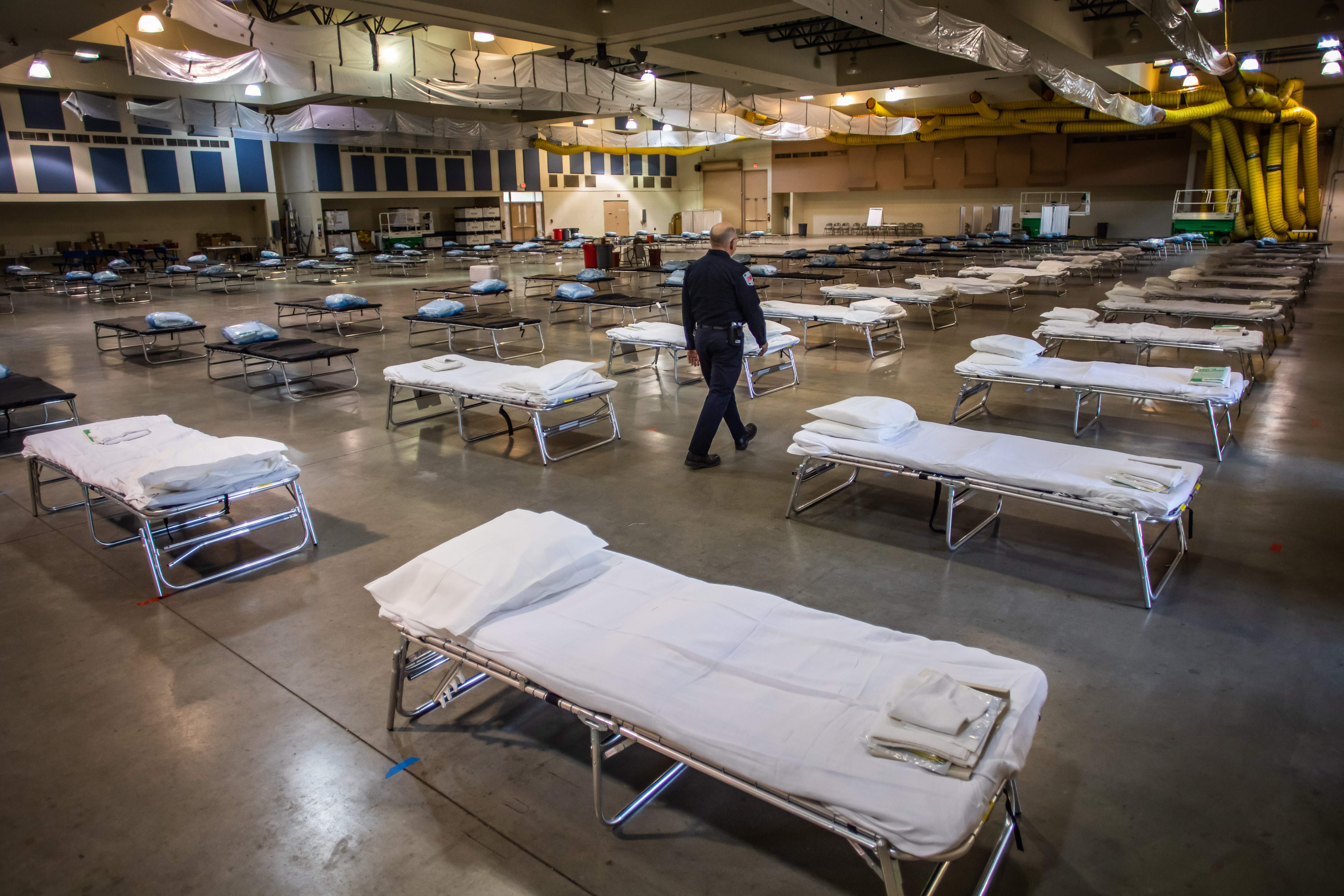 A temporary hospital which is been settled up by members of the California National Guard is seen in Indio, California on March 29, 2020. - The new field hospital with 125 beds will help ease the burden on the local hospital system amid the growing COVID-19 Coronavirus crises. (Photo by Apu Gomes/AFP via Getty Images)