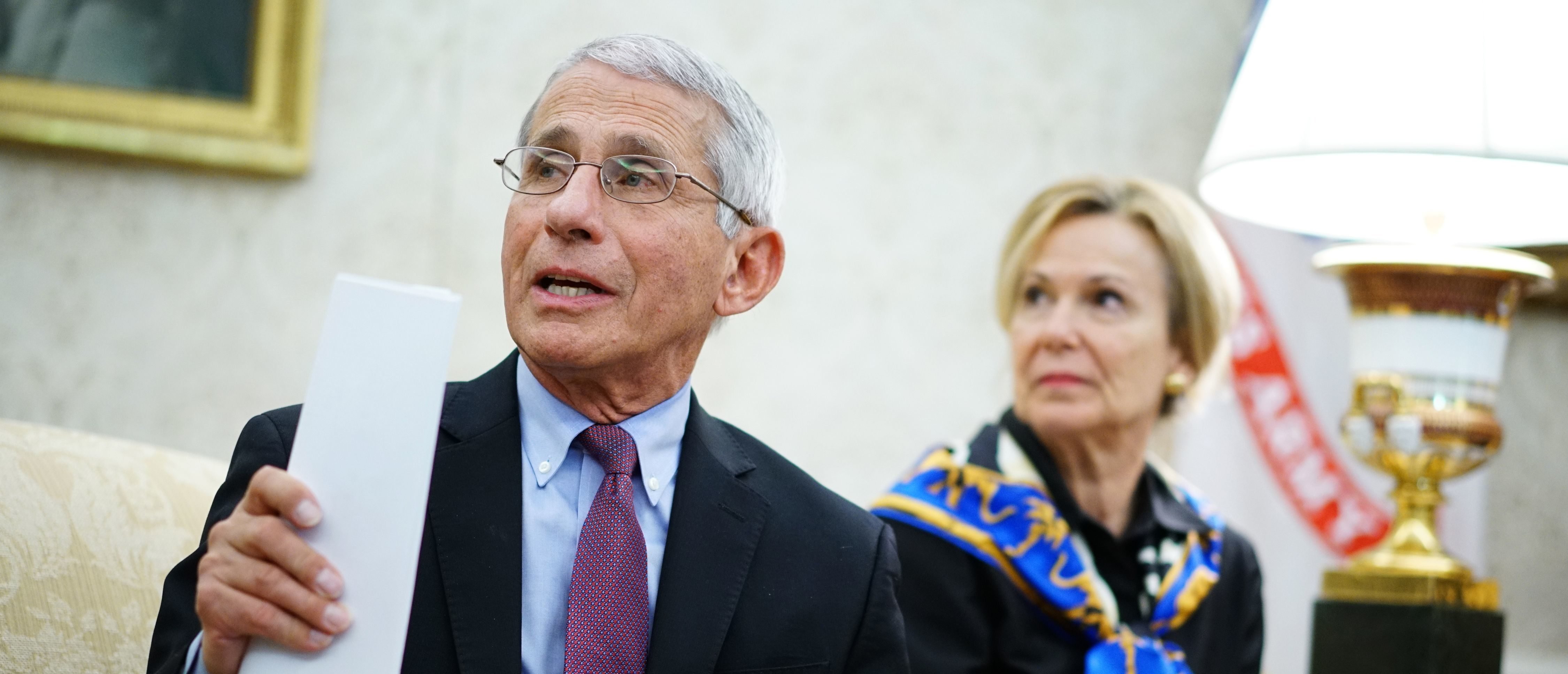 Dr. Anthony Fauci (L), director of the National Institute of Allergy and Infectious Diseases speaks next to Response coordinator for White House Coronavirus Task Force Deborah Birx, during a meeting with US President Donald Trump and Louisiana Governor John Bel Edwards D-LA in the Oval Office of the White House in Washington, DC on April 29, 2020. (Photo by MANDEL NGAN/AFP via Getty Images)