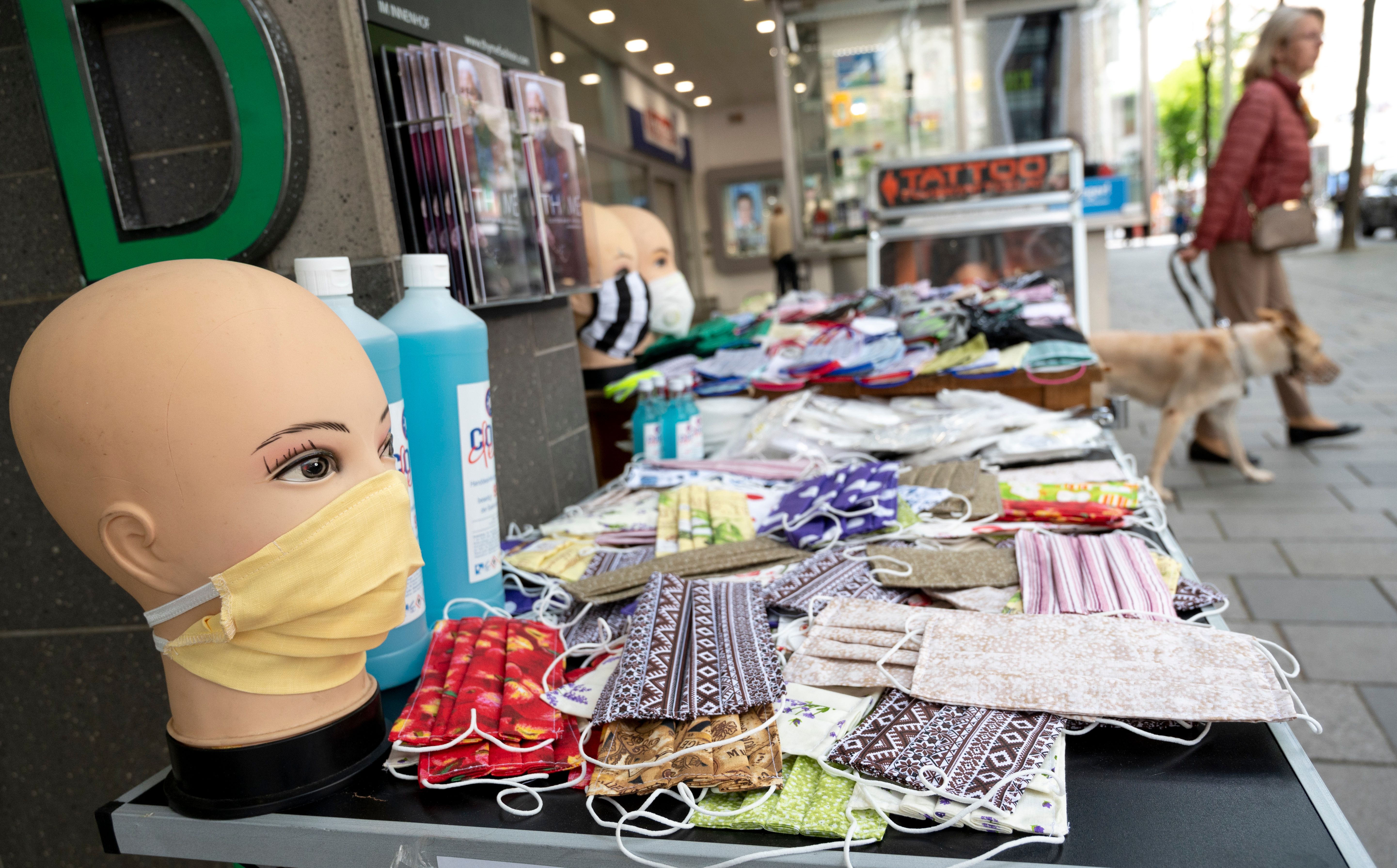 Handmade face masks on display are sold by a street vendor in Vienna, Austria on May 4, 2020. (Photo by JOE KLAMAR/AFP via Getty Images)