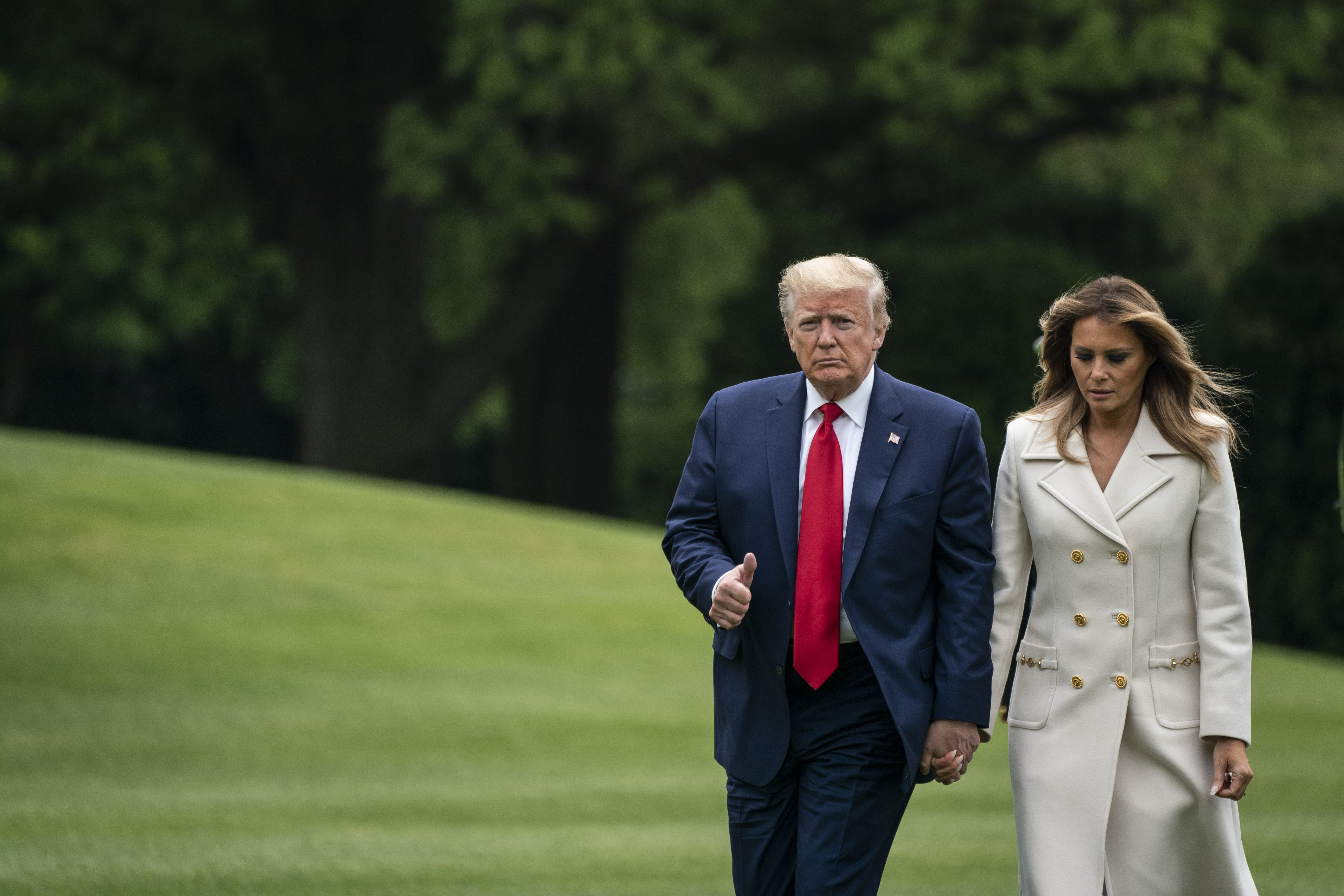 WASHINGTON, DC - MAY 25: U.S. President Donald Trump and first lady Melania Trump arrive to the South Lawn of the White House after a trip to Baltimore, Maryland on May 25, 2020 in Washington, DC. The Trumps attended a Memorial Day ceremony at the Fort McHenry National Monument and Historic Shrine despite objections by Baltimore Mayor Bernard C. Jack Young, whose residents remain under a stay-at-home order due to the coronavirus. (Photo by Sarah Silbiger/Getty Images)