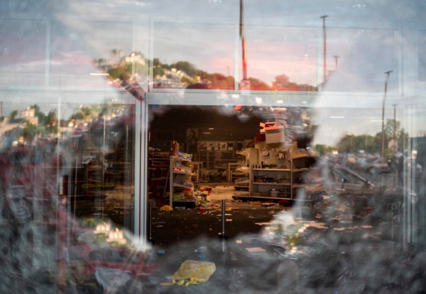 A view inside a Target store through a broken window on May 27, 2020 in Minneapolis, Minnesota. (Stephen Maturen/Getty Images)