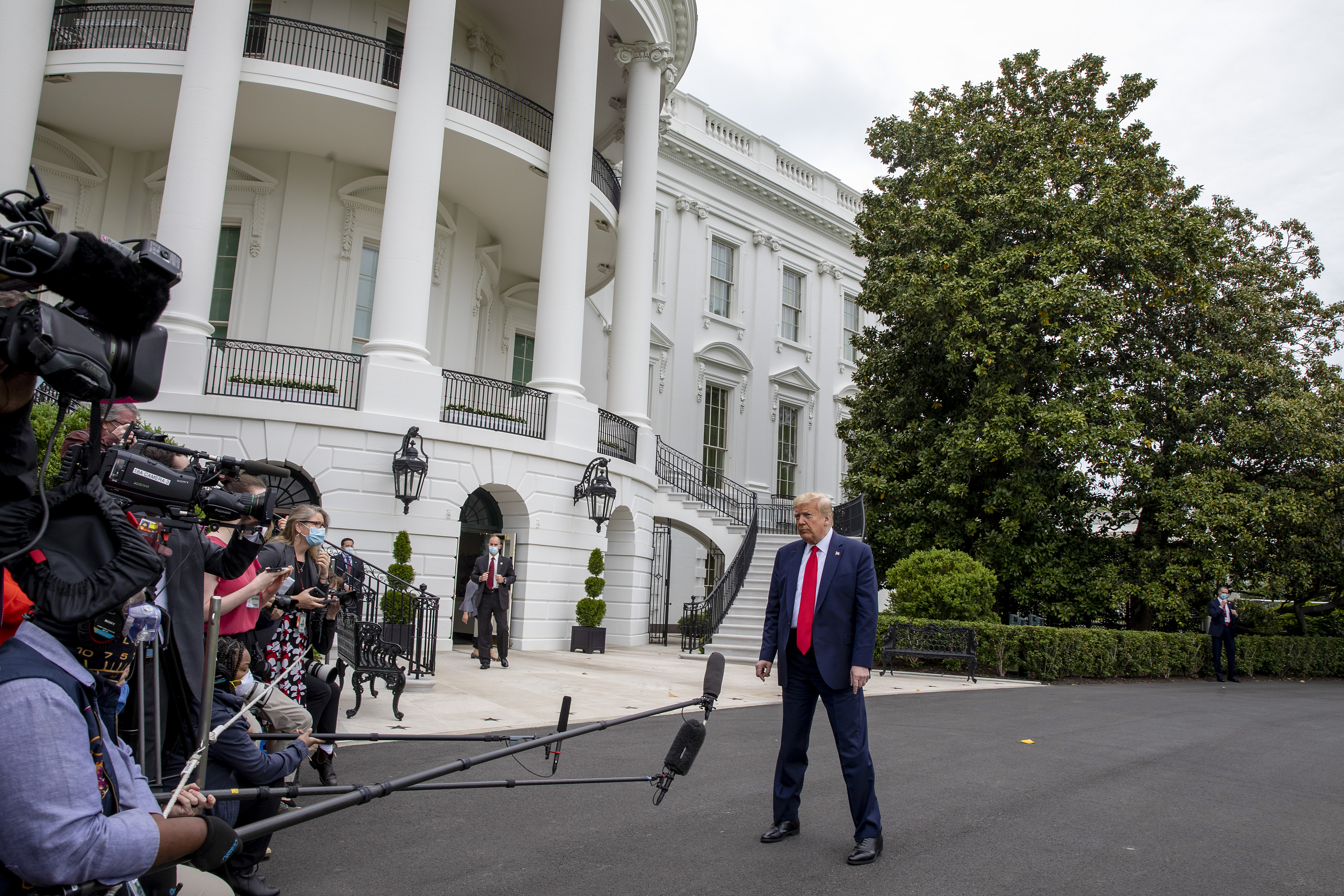 WASHINGTON, DC - MAY 17: US President Donald Trump talks to the media after landing on the south lawn of the White House on May 17, 2020 in Washington, DC. Asked by the media if he had seen President Obama's graduation remarks the night before, Trump said he had not and added, "...he was an incompetent president, that's all I can say." (Photo by Tasos Katopodis/Getty Images)