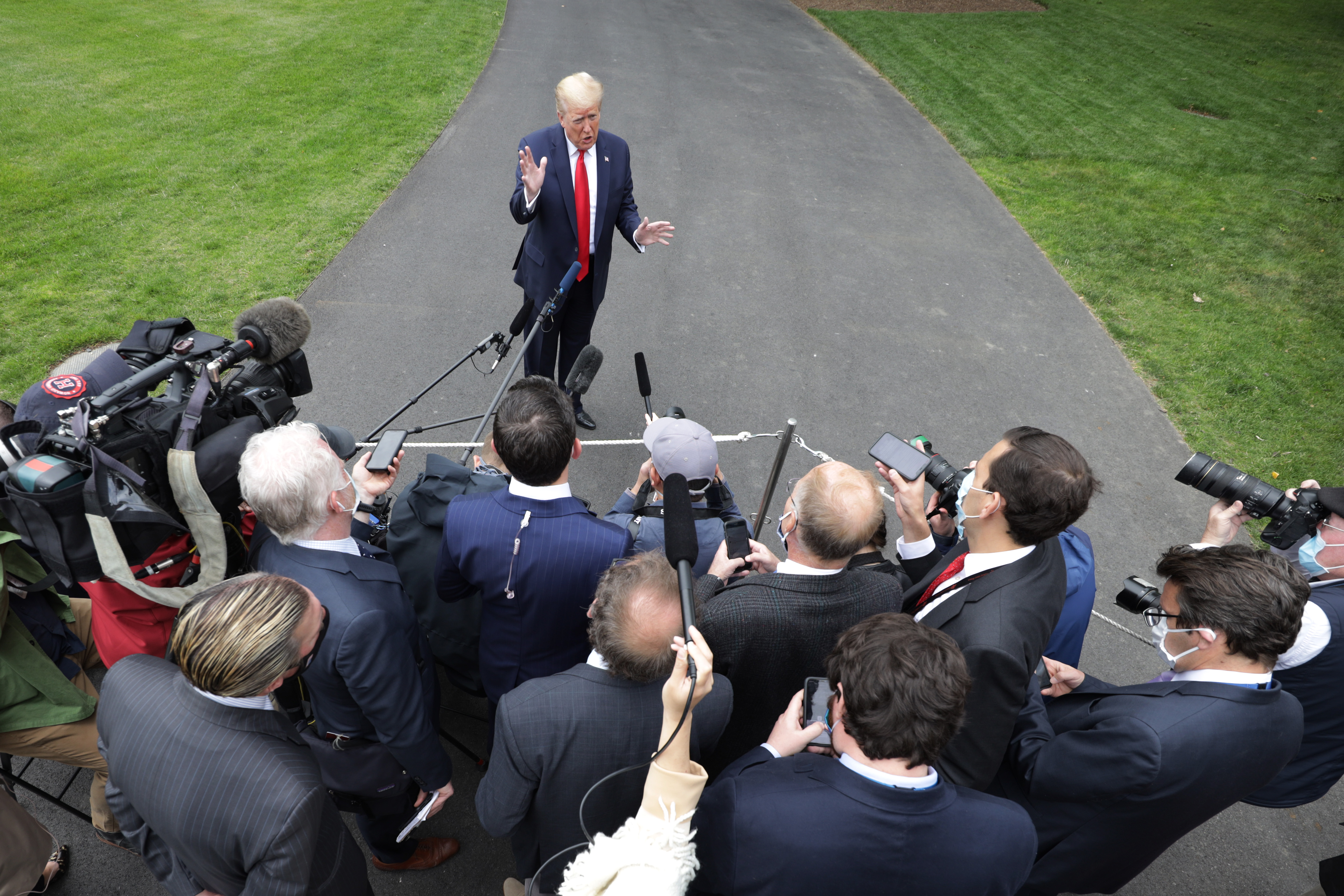 WASHINGTON, DC - MAY 21: U.S. President Donald Trump speaks to the press on the South Lawn of the White House prior to departing on Marine One May 21, 2020 in Washington, DC. President Trump is scheduled to visit a Ford manufacturing plant that is currently producing ventilators in Michigan. (Photo by Alex Wong/Getty Images)