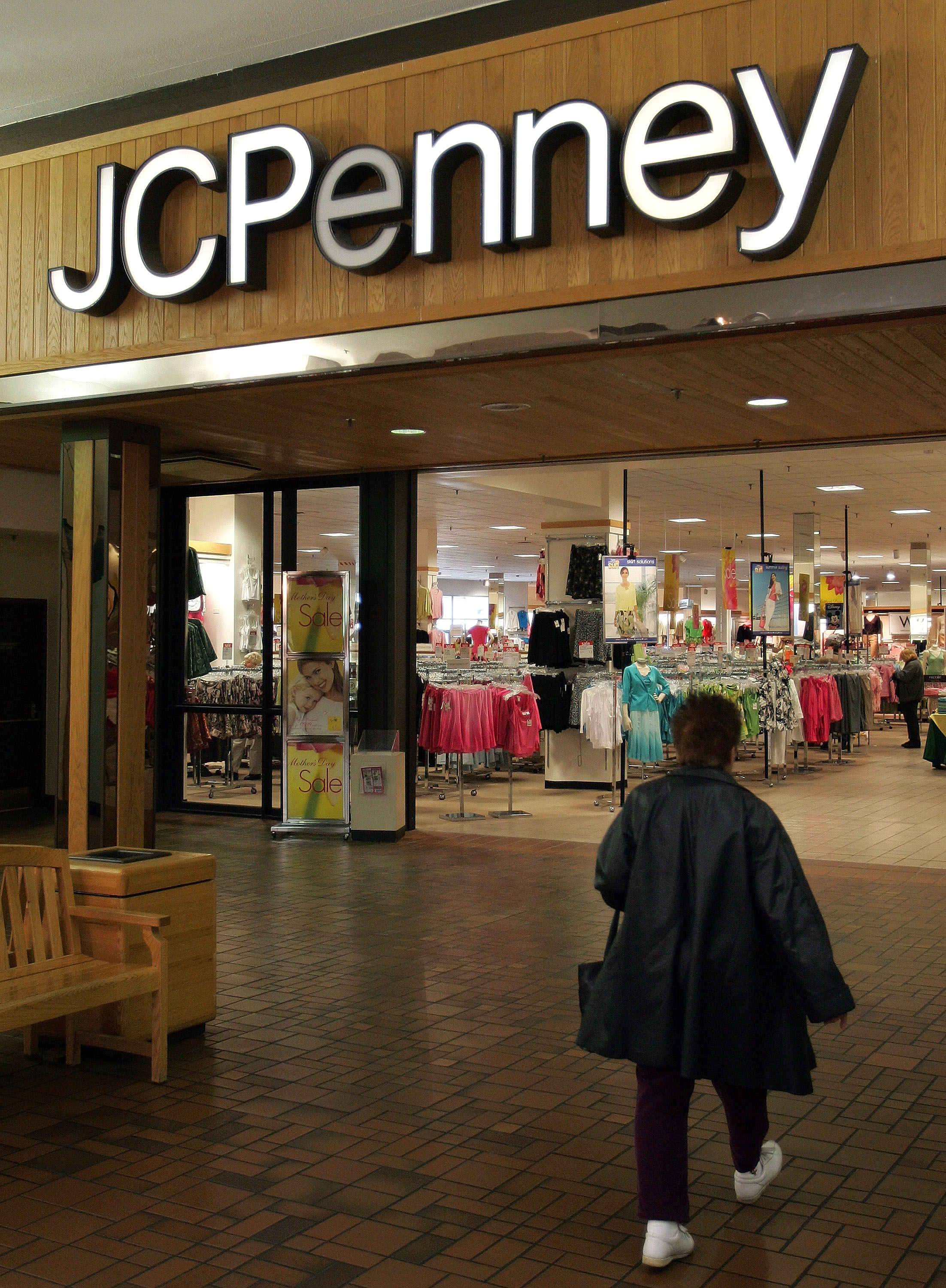 A woman walks toward the entrance of a JCPenney store May 3, 2005 in Niles, Illinois. (Photo by Tim Boyle/Getty Images)