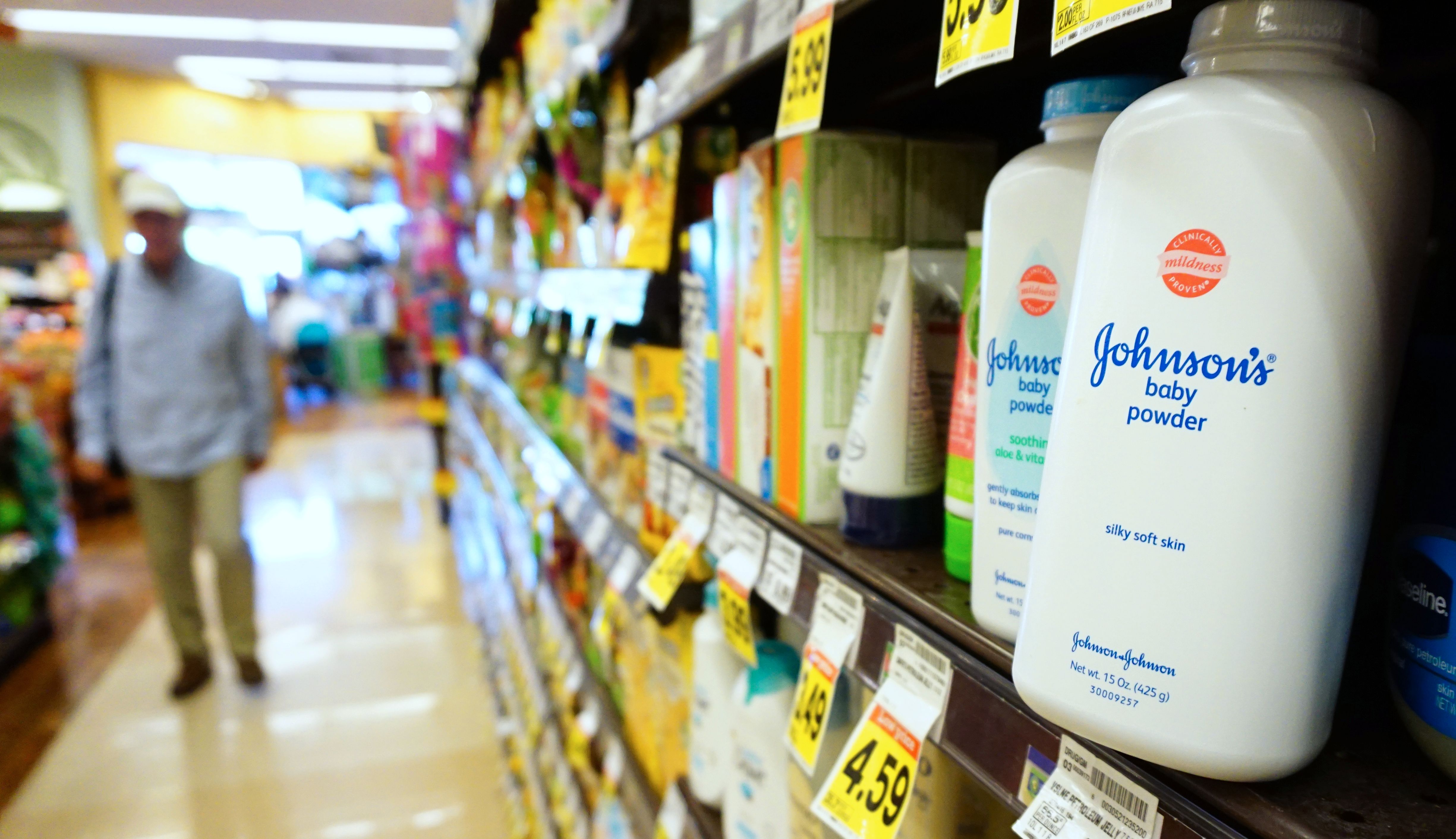 Johnson's baby powder remains stocked at a supermarket shelf on August 22, 2017 in Alhambra, California, where a Los Angeles jury on August 21 ordered Johnson & Johnson to pay a record $417 million to a woman in hospital who sued the company. A California jury on August 21, 2017 ordered drugmaker Johnson & Johnson to pay 417 million dollars to a woman who claimed she developed terminal ovarian cancer after using the company's talc-based products.The case was one of thousands of lawsuits brought nationwide alleging the company failed to warn consumers of the risk of cancer from talc in its products. (Frederic J. Brown/AFP via Getty Images)