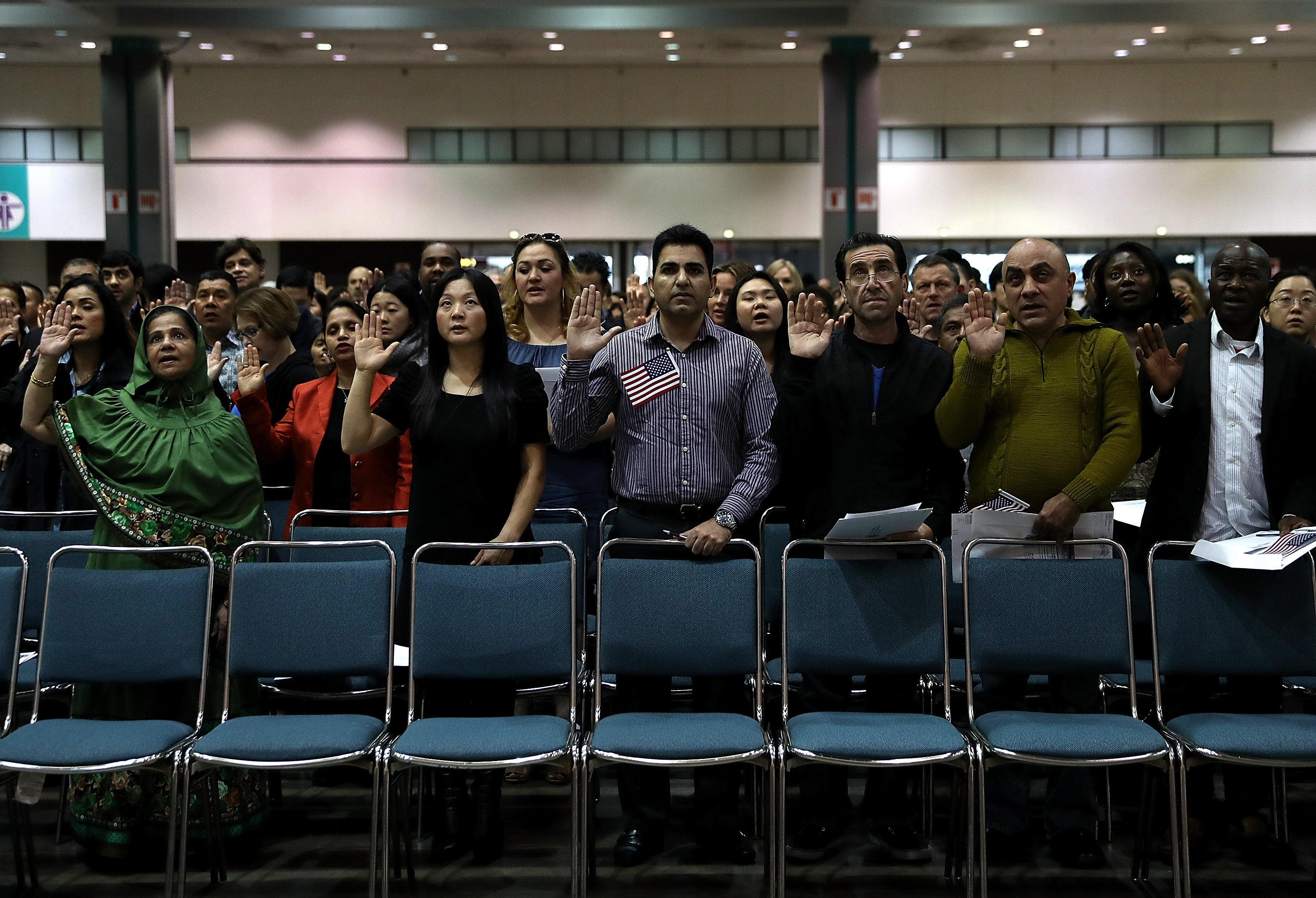 Immigrants Are Sworn In As U.S. Citizens In Naturalization Ceremony At L.A. Convention Center