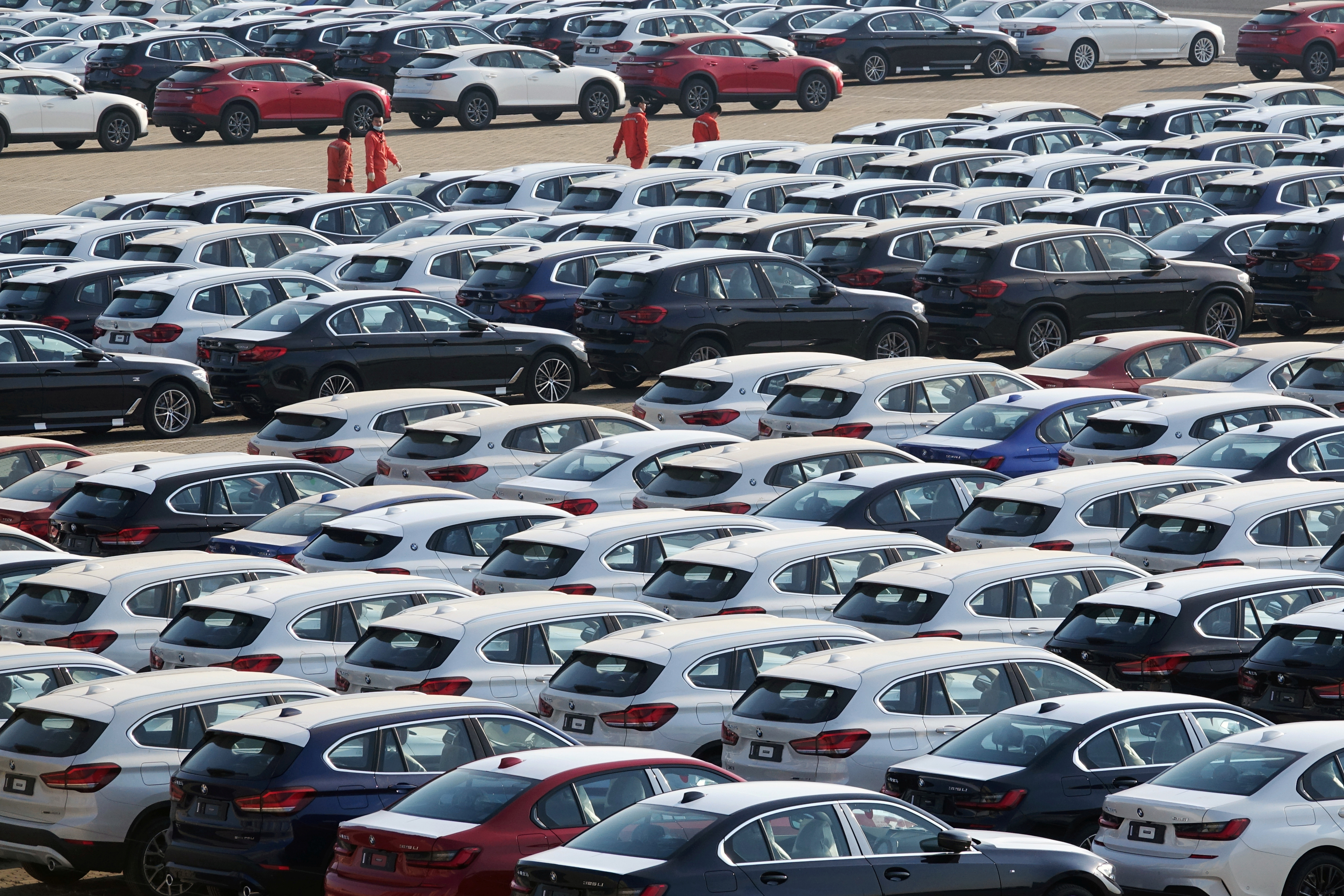 Newly manufactured cars are seen at a port in Dalian, Liaoning province, China April 10, 2020. China Daily via REUTERS ATTENTION EDITORS - THIS IMAGE WAS PROVIDED BY A THIRD PARTY. CHINA OUT. - RC2J1G9ZJA4M