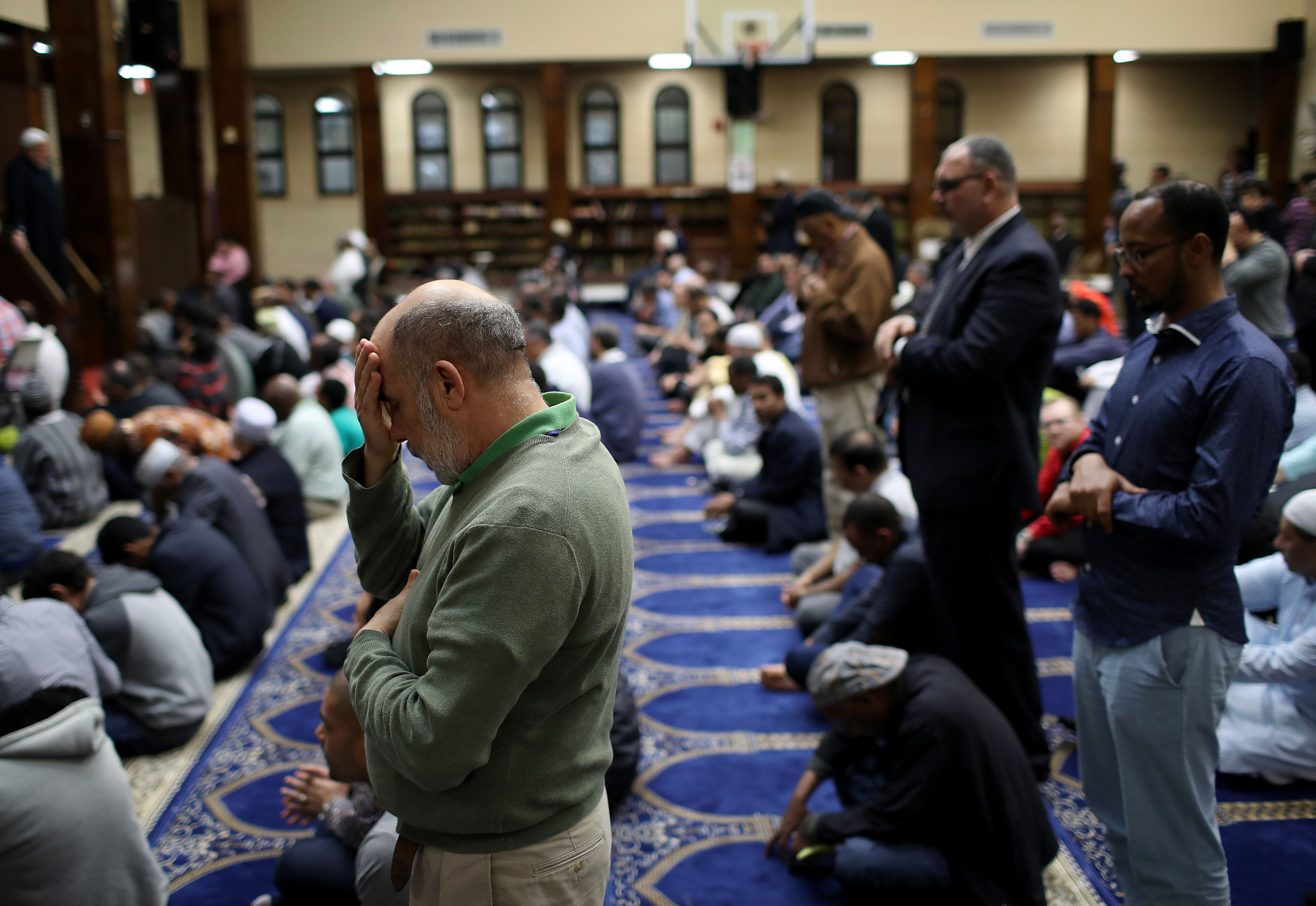 Muslim Americans take part in Friday prayers at the Dar Al Hijrah Islamic Center March 15, 2019 in Falls Church, Virginia. 49 people were killed in a terror attack at a mosque in Christchurch, New Zealand. (Photo by Win McNamee/Getty Images)