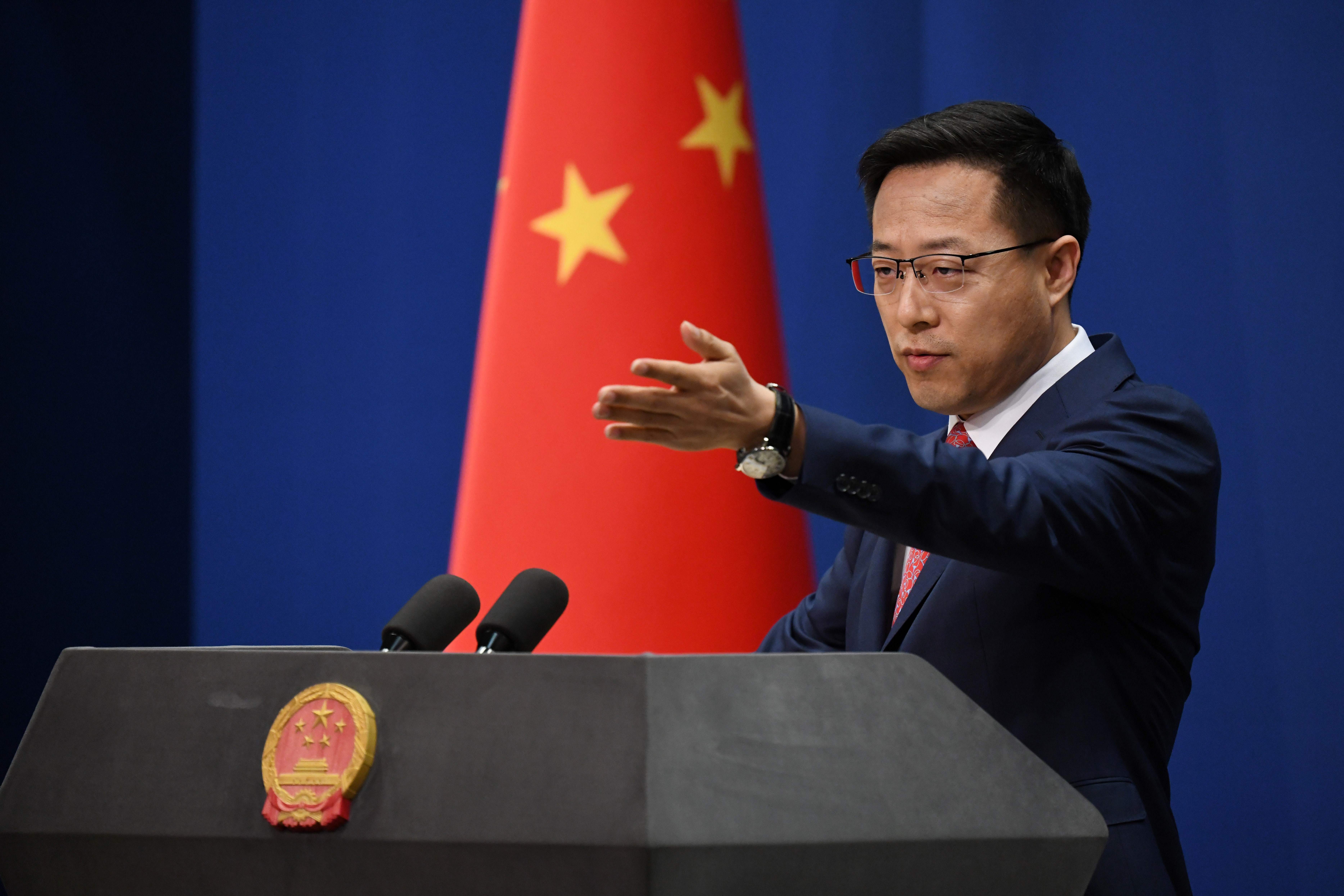 Chinese Foreign Ministry spokesman Zhao Lijian takes a question at the daily media briefing in Beijing on April 8, 2020. (GREG BAKER/AFP via Getty Images)