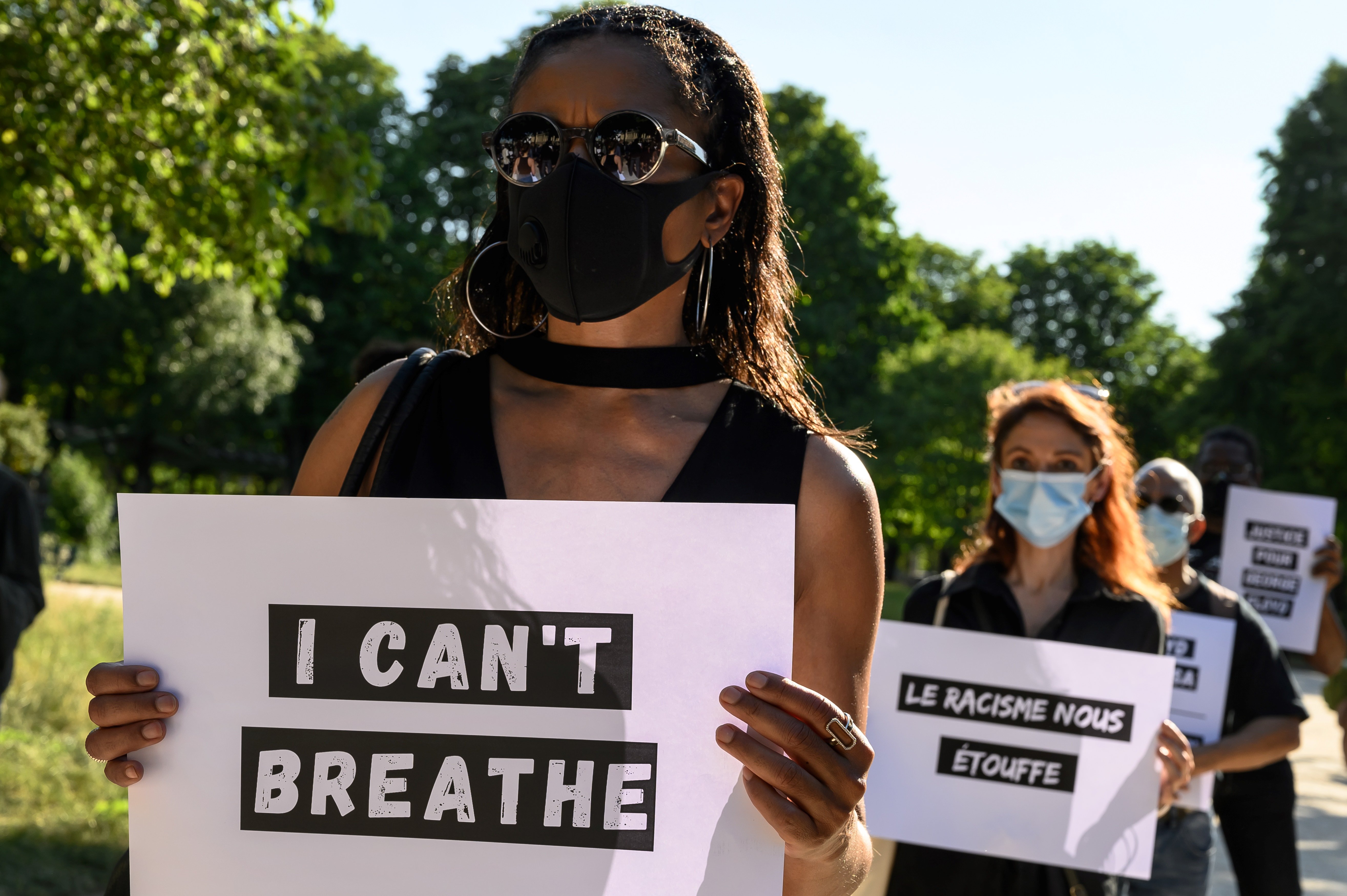 Protesters demonstrate outside the United States Embassy in Paris on June 1, 2020, after the police killing of unarmed black man George Floyd in the USA. (Photo by BERTRAND GUAY/AFP via Getty Images)