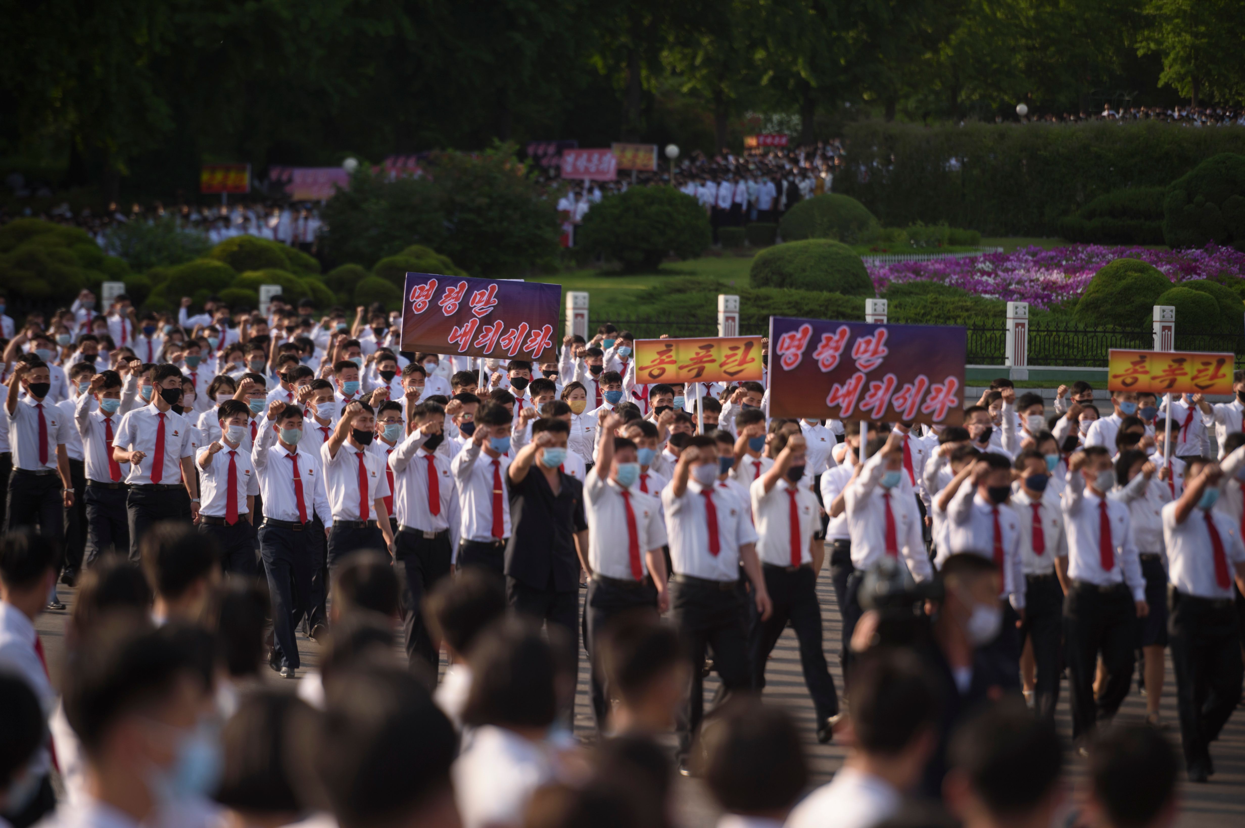 North Korean students take part in a rally denouncing 'defectors from the North' as they march from the Pyongyang Youth Park Open-Air Theatre to Kim Il Sung Square in Pyongyang on June 8, 2020.(Photo by KIM WON JIN/AFP via Getty Images)