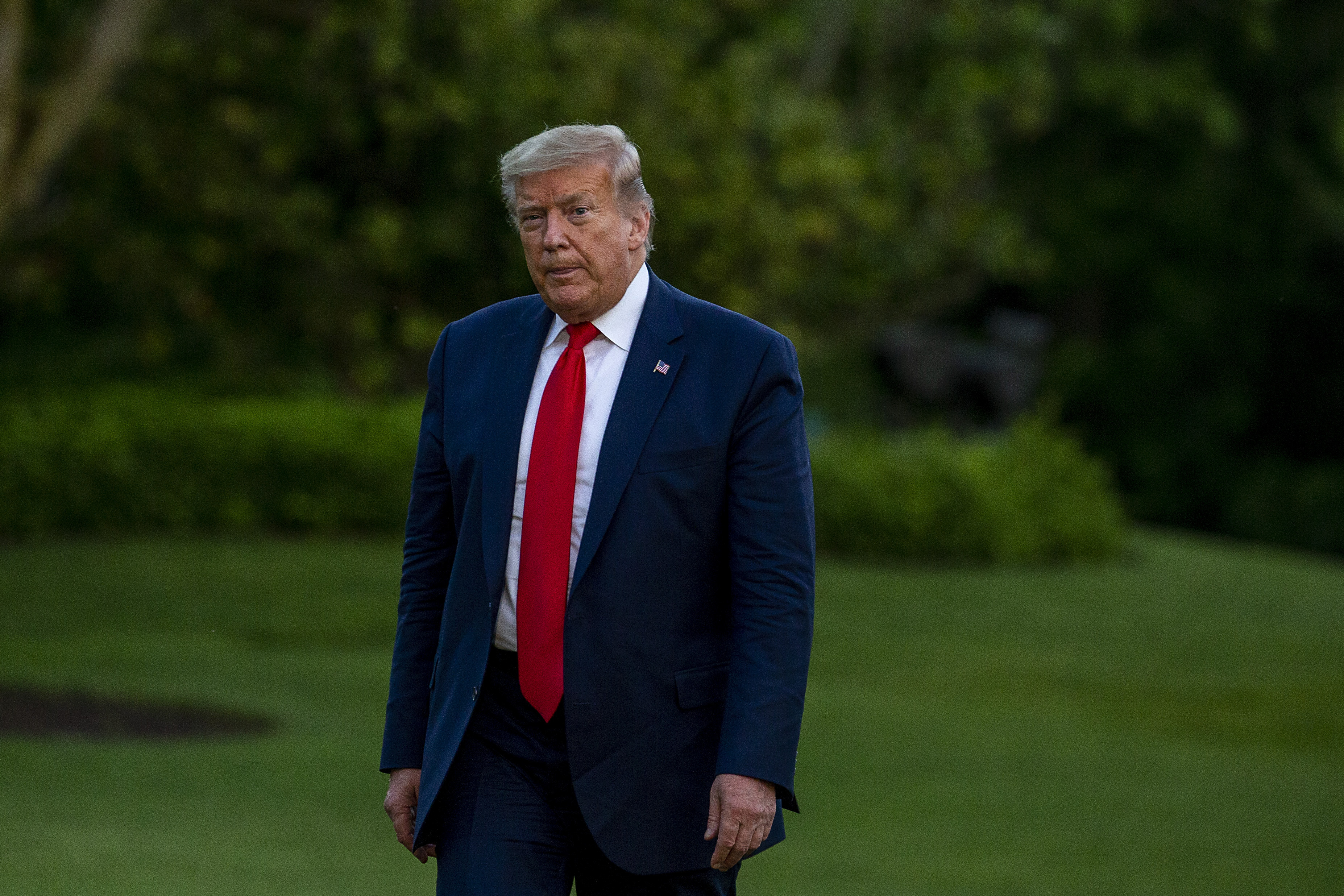 WASHINGTON, DC - MAY 30: U.S. President Donald Trump walks off Marine One on May 30, 2020 in Washington, DC. President Trump returned to Washington after the successful launch of the SpaceX Falcon 9 rocket with the manned Crew Dragon spacecraft at the Kennedy Space Center in Florida. (Photo by Tasos Katopodis/Getty Images)