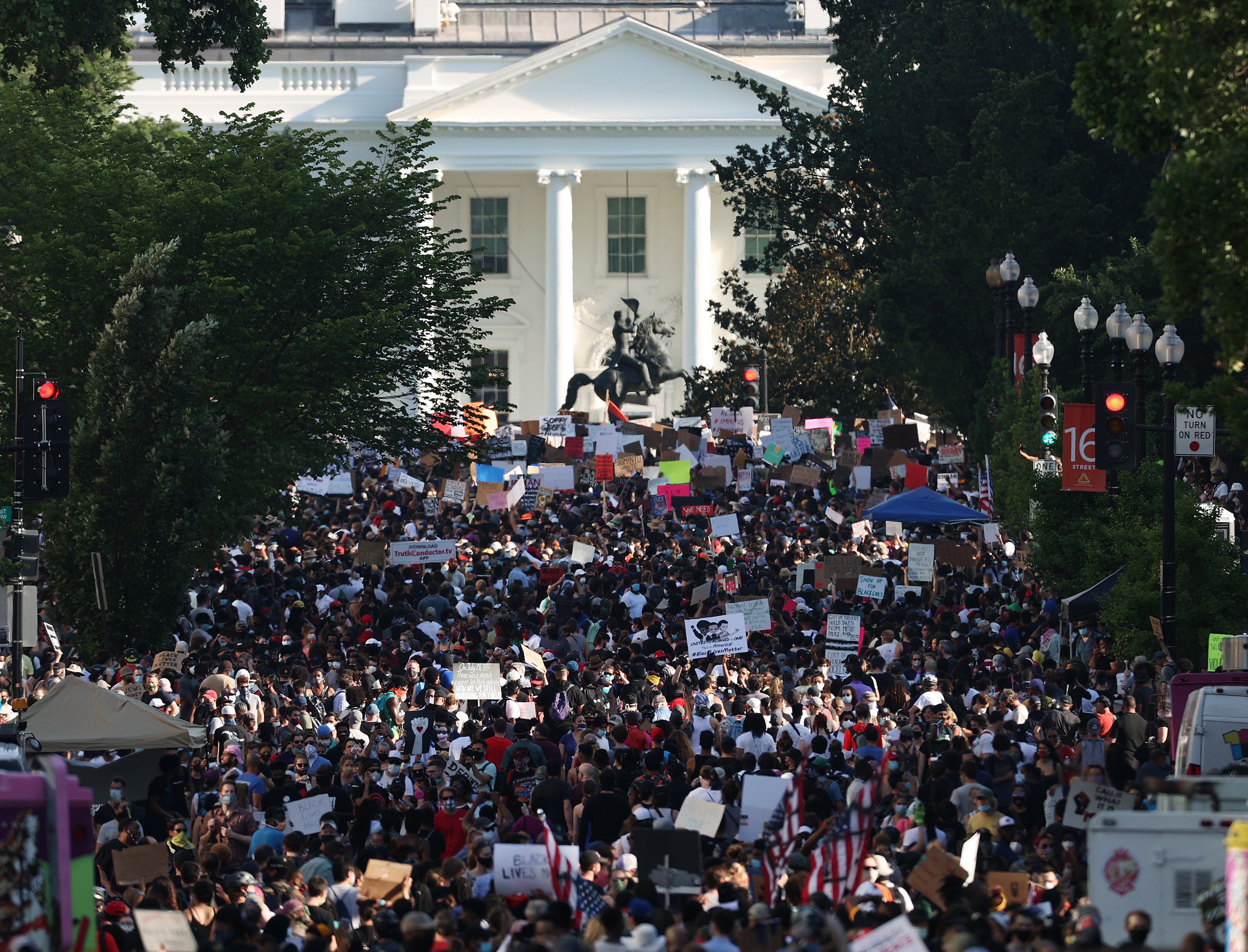 Demonstrators gather on 16th Street and the portion newly named Black Lives Plaza across from Lafayette Park while protesting peacefully against police brutality and racism on June 6, 2020 in Washington, DC. (Win McNamee/Getty Images)