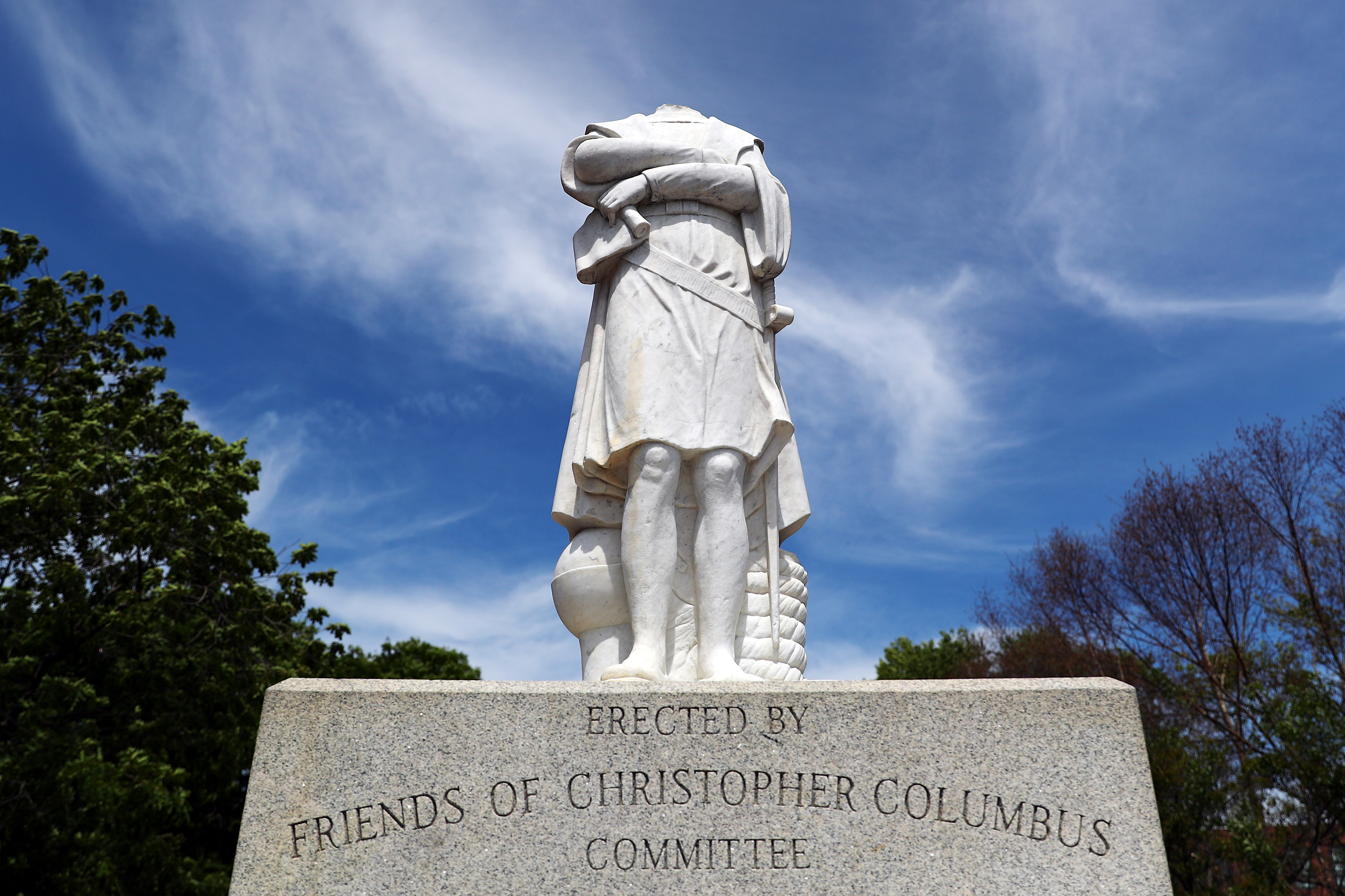 A statue depicting Christopher Columbus is seen with its head removed at Christopher Columbus Waterfront Park on June 10, 2020 in Boston, Massachusetts. The statue was beheaded overnight and is scheduled to be removed by the City of Boston. (Photo by Tim Bradbury/Getty Images)