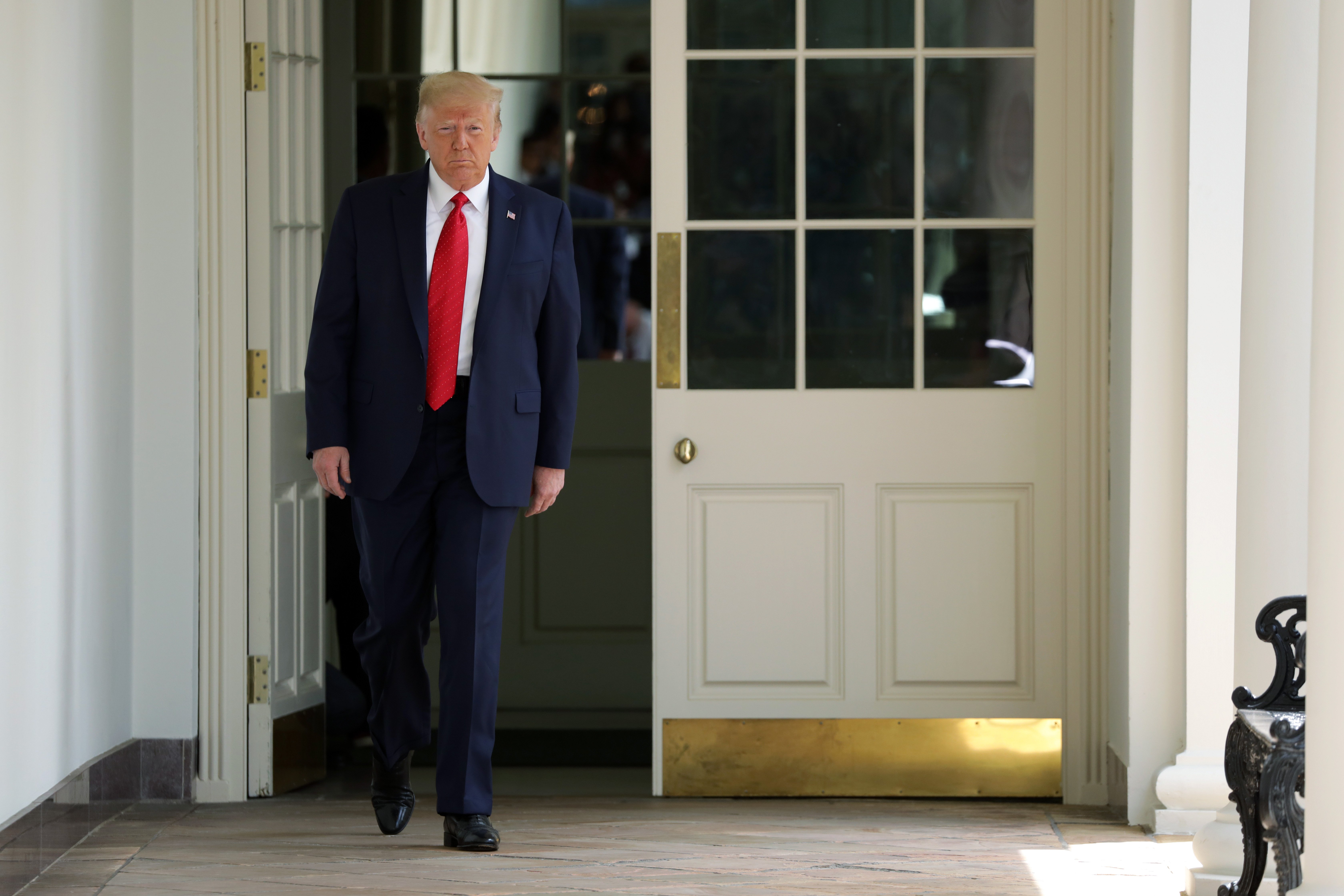 WASHINGTON, DC - JUNE 16: U.S. President Donald Trump arrives for an event in the Rose Garden on “Safe Policing for Safe Communities”, at the White House June 16, 2020 in Washington, DC. President Trump signed an executive order on police reform amid the growing calls after the death of George Floyd. (Photo by Alex Wong/Getty Images)