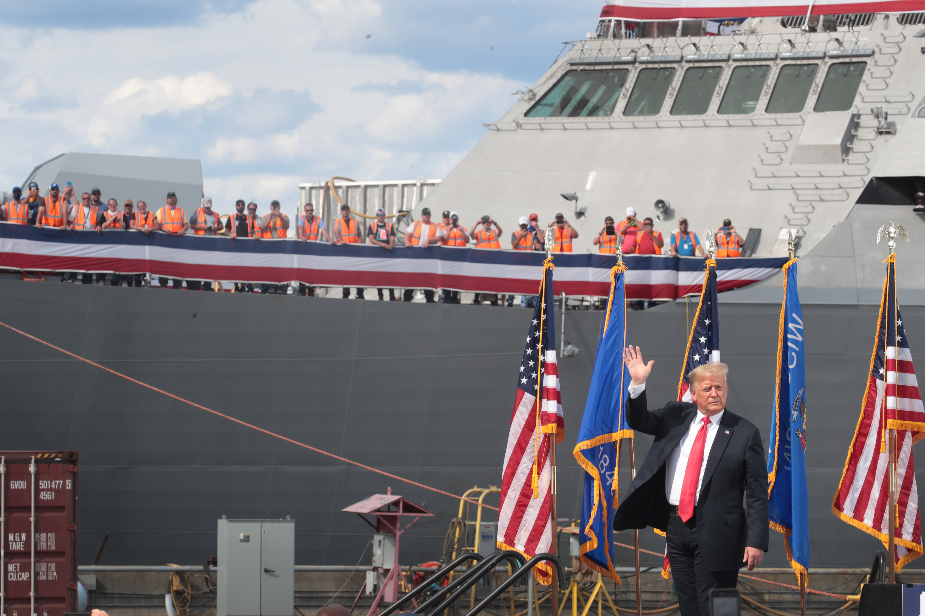 MARINETTE, WISCONSIN - JUNE 25: US President Donald Trump waves after speaking to guests during a visit to the Fincantieri Marinette Marine shipyard on June 25, 2020 in Marinette, Wisconsin. The company was recently awarded a $5.5 billion contract to build ships for the U.S. Navy. (Photo by Scott Olson/Getty Images)