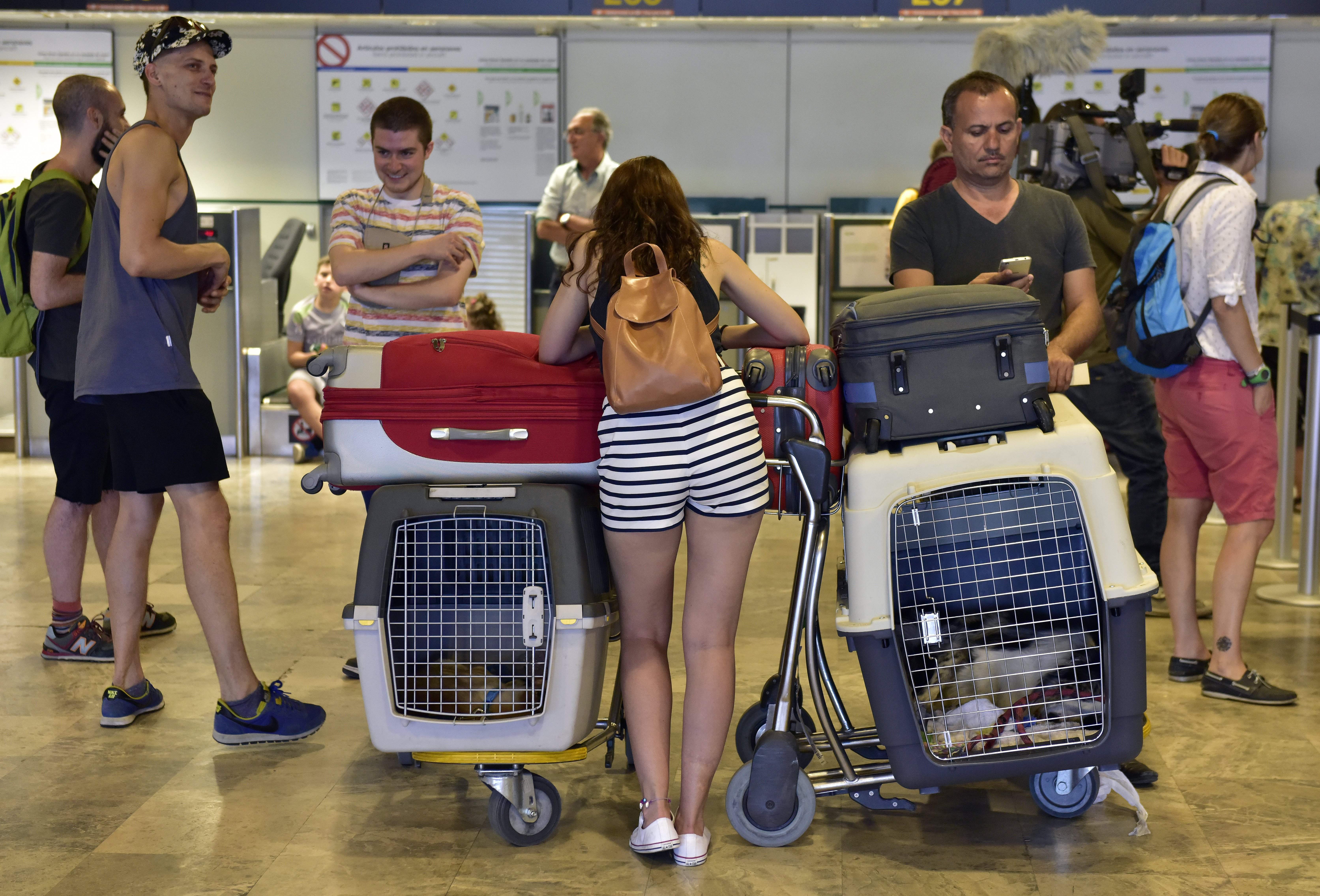 Some 200 exasperated Aeromexico customers were camped-out today at Madrid-Barajas airport, some for the past two weeks, waiting to see if in the coming days they will be able to fly to Mexico after purchasing at a low price dependent on availability. (GERARD JULIEN/AFP via Getty Images)