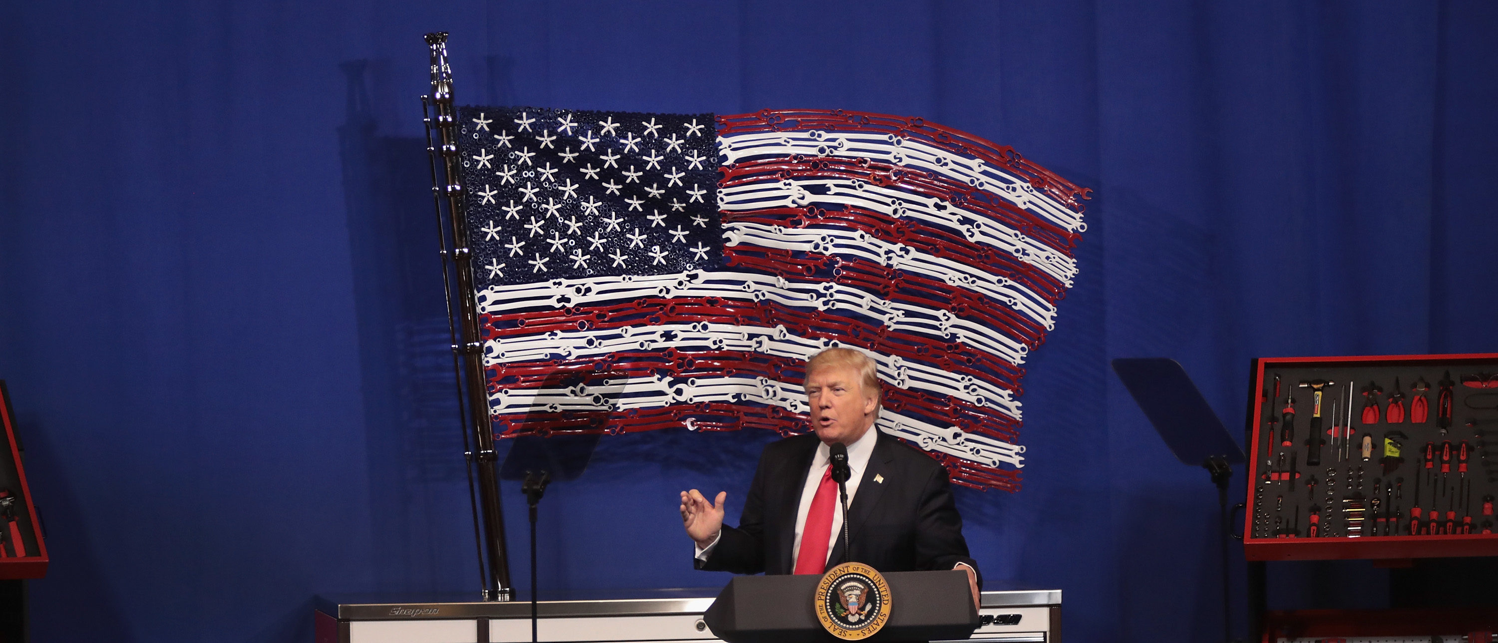 KENOSHA, WI - APRIL 18: President Donald Trump speaks to workers at the headquarters of tool manufacturer Snap-On on April 18, 2017 in Kenosha, Wisconsin. During the visit, Trump signed an executive order to try to bring jobs back to American workers and revamp the H-1B visa guest worker program. (Photo by Scott Olson/Getty Images)
