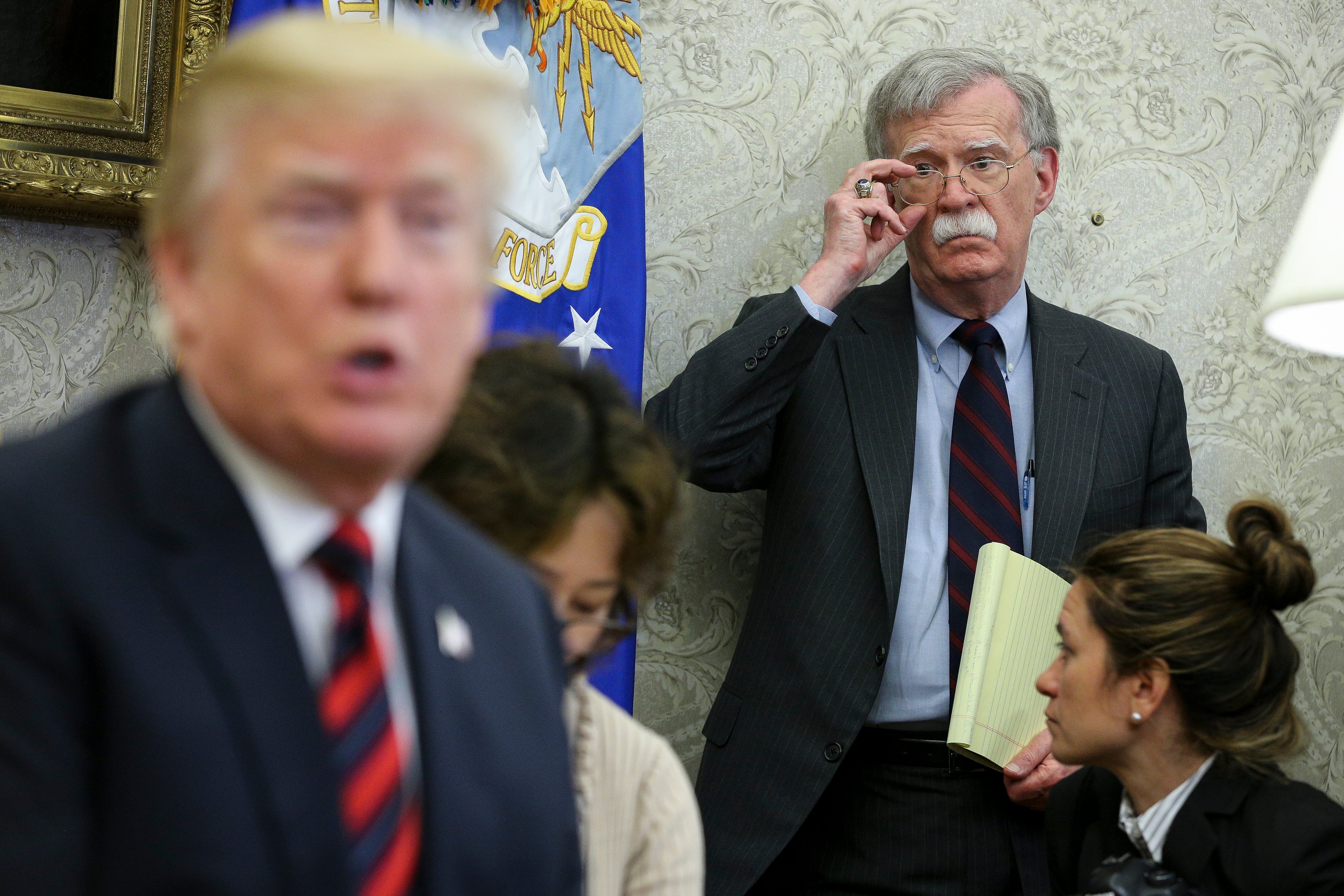 WASHINGTON, DC - MAY 22: US President Donald Trump speaks as National security advisor John Bolton listens during a meeting with South Korean President Moon Jae-in, in the Oval Office of the White House on May 22, 2018 in Washington DC. (Photo by Oliver Contreras-Pool/Getty Images)