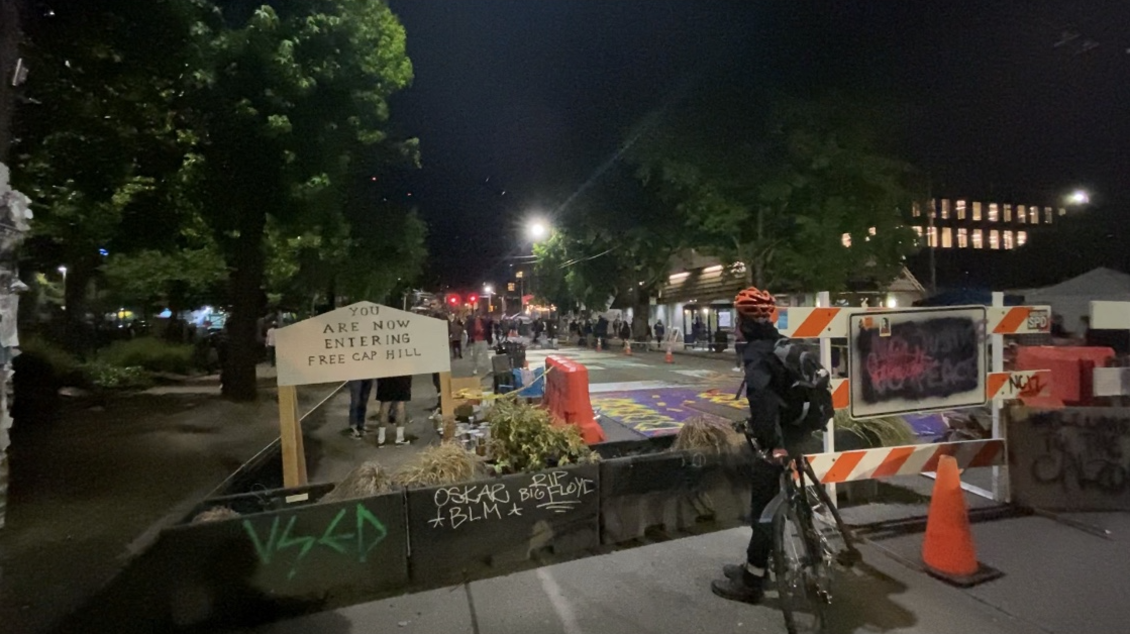 Many of the entry points have both barriers and parked cars, as well as guards protecting CHAZ. (Credit Shelby Talcott)