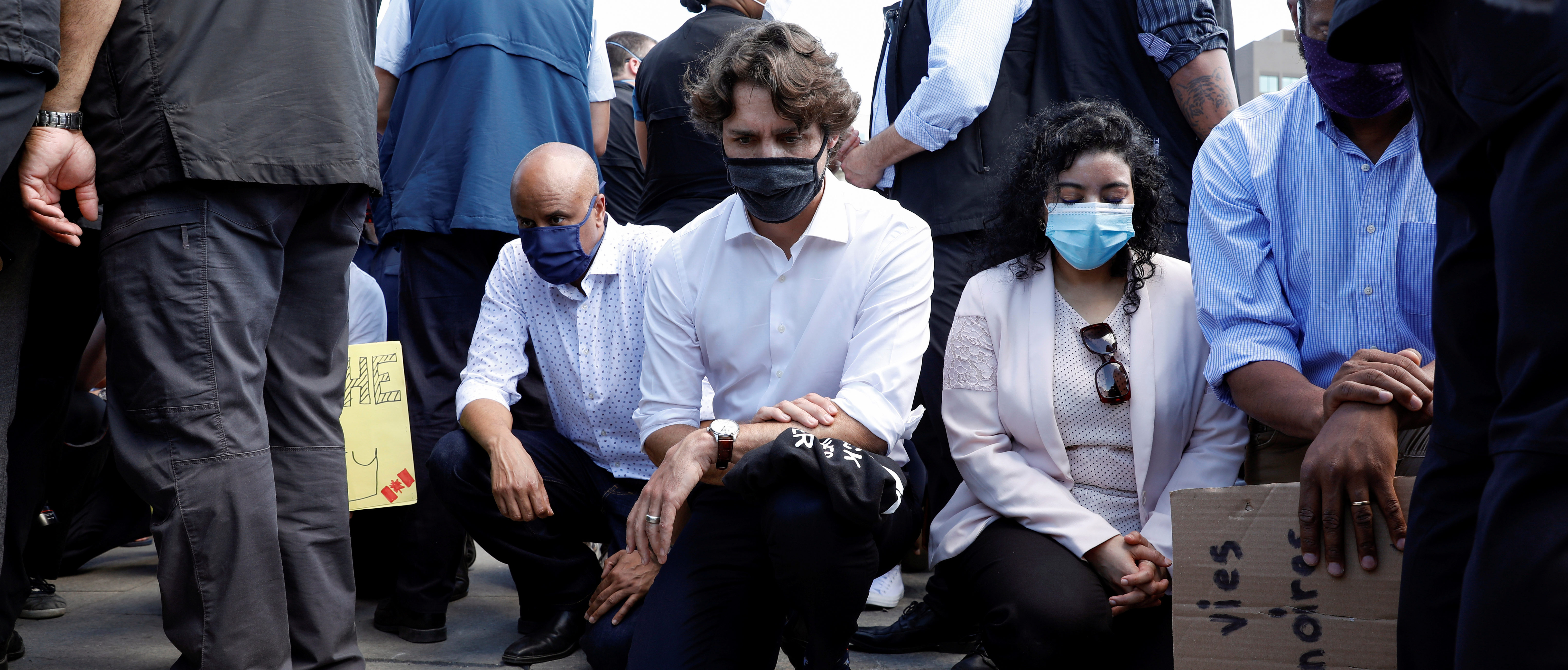 Canada's Prime Minister Justin Trudeau wears a mask as he takes part in a rally against the death in Minneapolis police custody of George Floyd, on Parliament Hill, in Ottawa, Ontario, Canada June 5, 2020. REUTERS/Blair Gable
