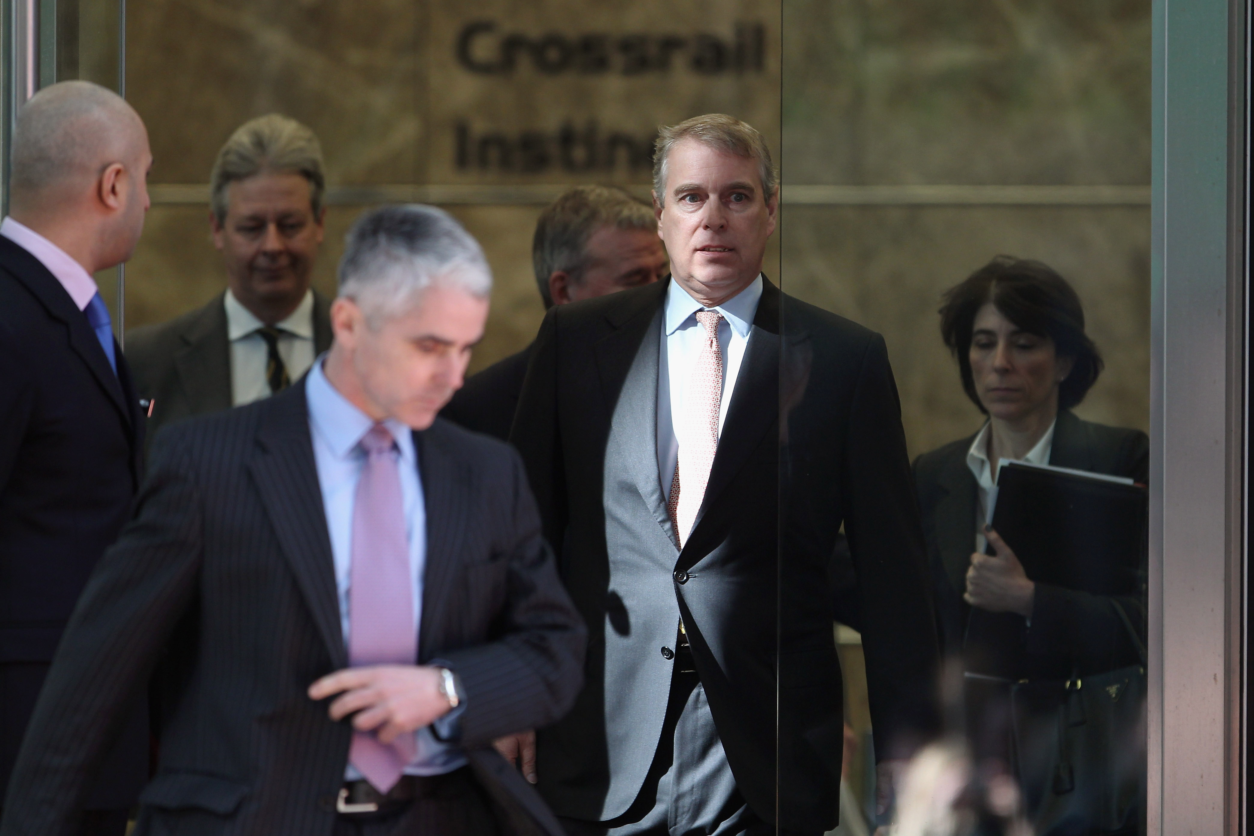 Prince Andrew, Duke of York (2nd R) leaves the headquarters of Crossrail at Canary Wharf on March 7, 2011 in London, England. Prince Andrew is under increasing pressure after a series of damaging revelations about him surfaced, including criticism over his friendship with convicted sex offender Jeffrey Epstein, an American financier. (Photo by Dan Kitwood/Getty Images)