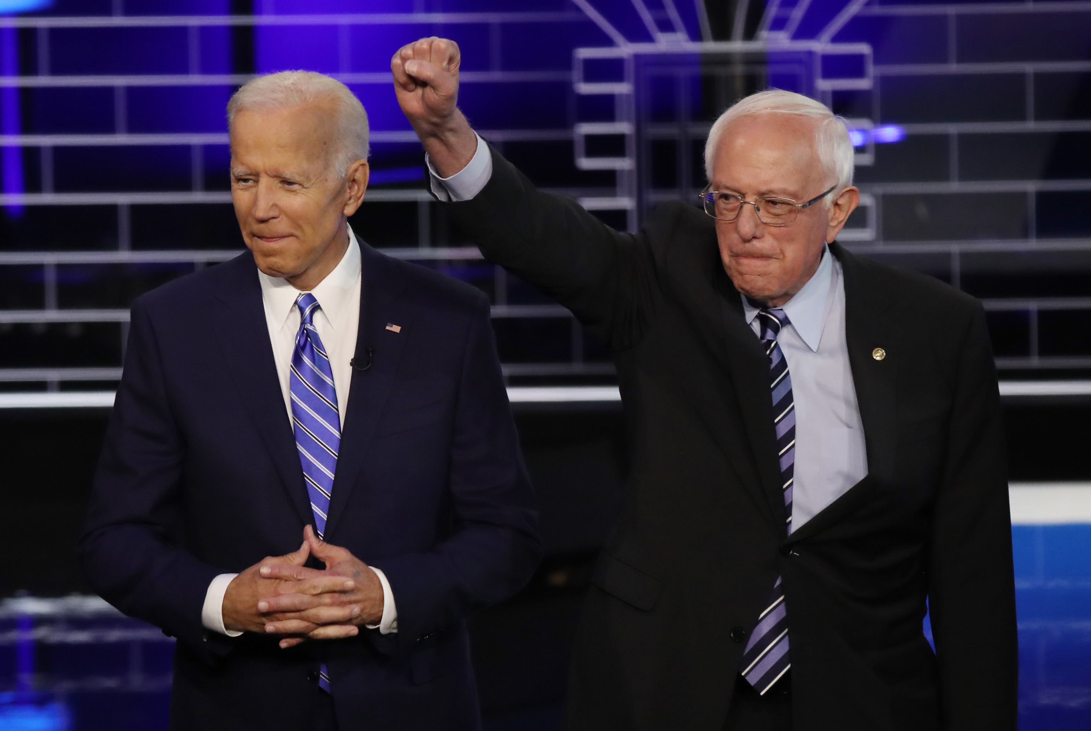 MIAMI, FLORIDA - JUNE 27: former Vice President Joe Biden and Sen. Bernie Sanders (I-VT) take the stage for the second night of the first Democratic presidential debate on June 27, 2019 in Miami, Florida. A field of 20 Democratic presidential candidates was split into two groups of 10 for the first debate of the 2020 election, taking place over two nights at Knight Concert Hall of the Adrienne Arsht Center for the Performing Arts of Miami-Dade County, hosted by NBC News, MSNBC, and Telemundo. (Photo by Drew Angerer/Getty Images)