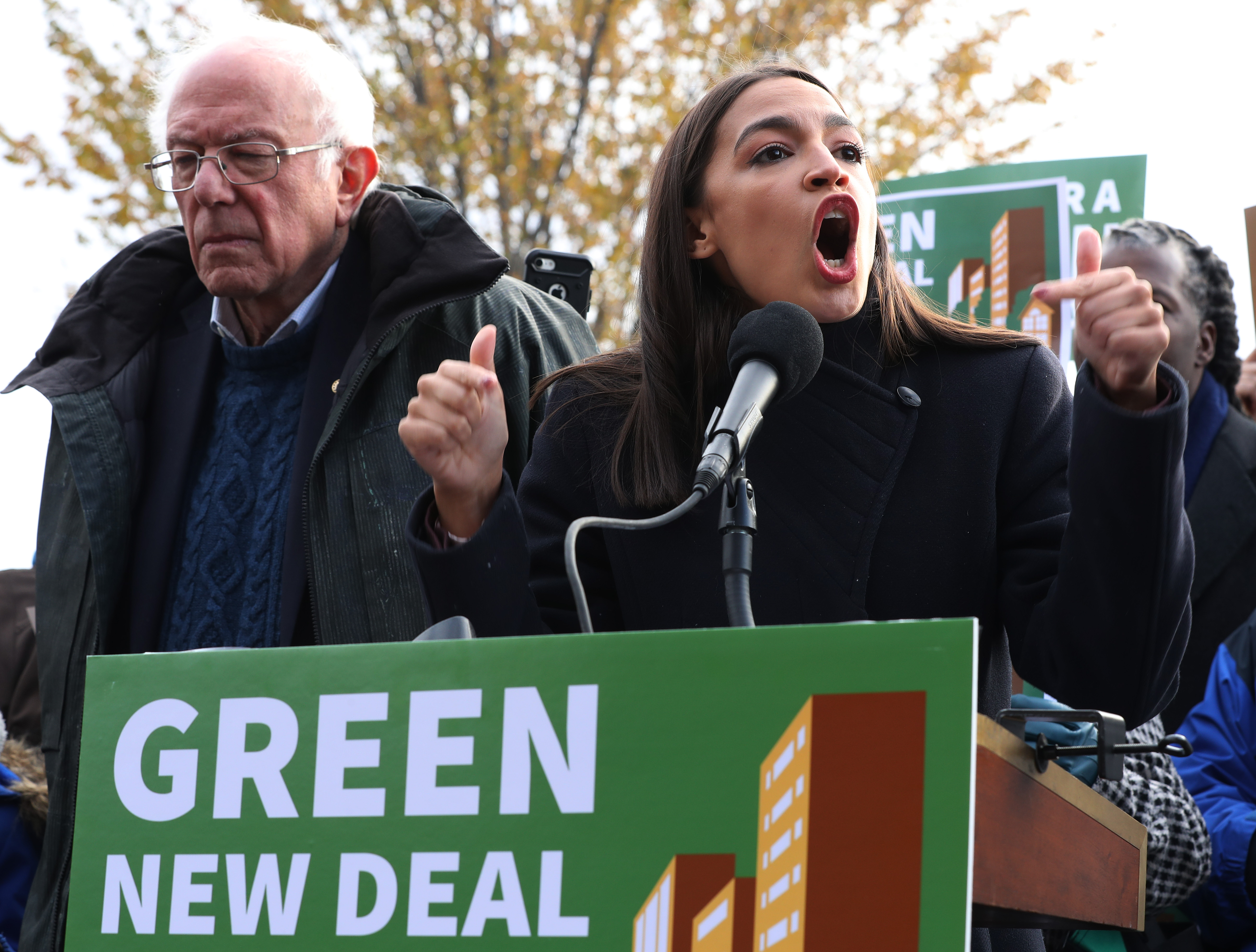 WASHINGTON, DC - NOVEMBER 14: Democratic presidential candidate Sen. Bernie Sanders (I-VT) (L) and Rep. Alexandria Ocasio-Cortez (D-NY) hold a news conference to introduce legislation to transform public housing as part of their Green New Deal proposal outside the U.S. Capitol November 14, 2019 in Washington, DC. The liberal legislators invited affordable housing advocates and climate change activists to join them for the announcement. (Photo by Chip Somodevilla/Getty Images)