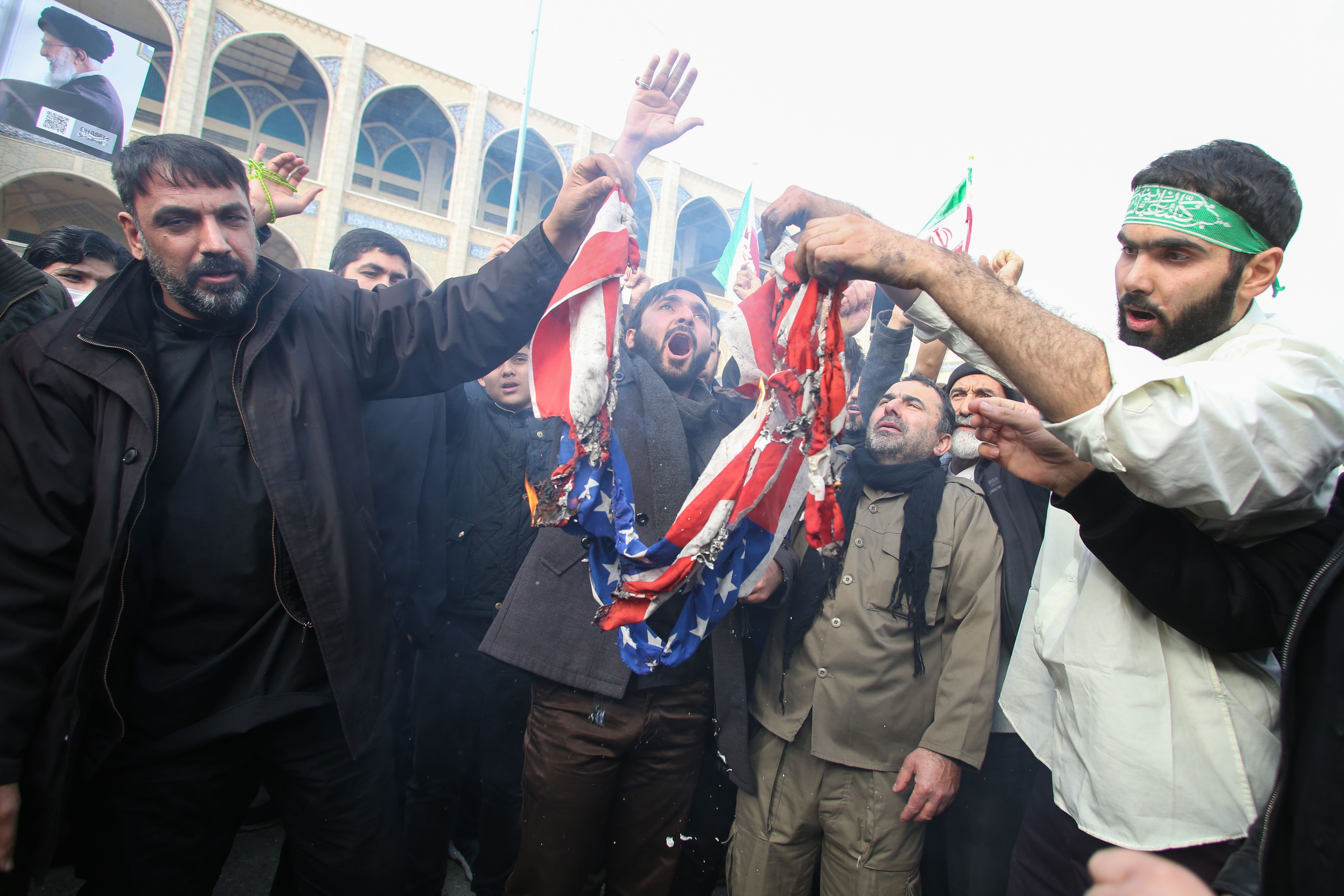 Iranians burn a U.S. flag during a demonstration against American "crimes" in Tehran on January 3, 2020 following the killing of Iranian Revolutionary Guards Major General Qasem Soleimani in a US strike on his convoy at Baghdad international airport. (Photo: Atta Kenare/AFP via Getty Images)