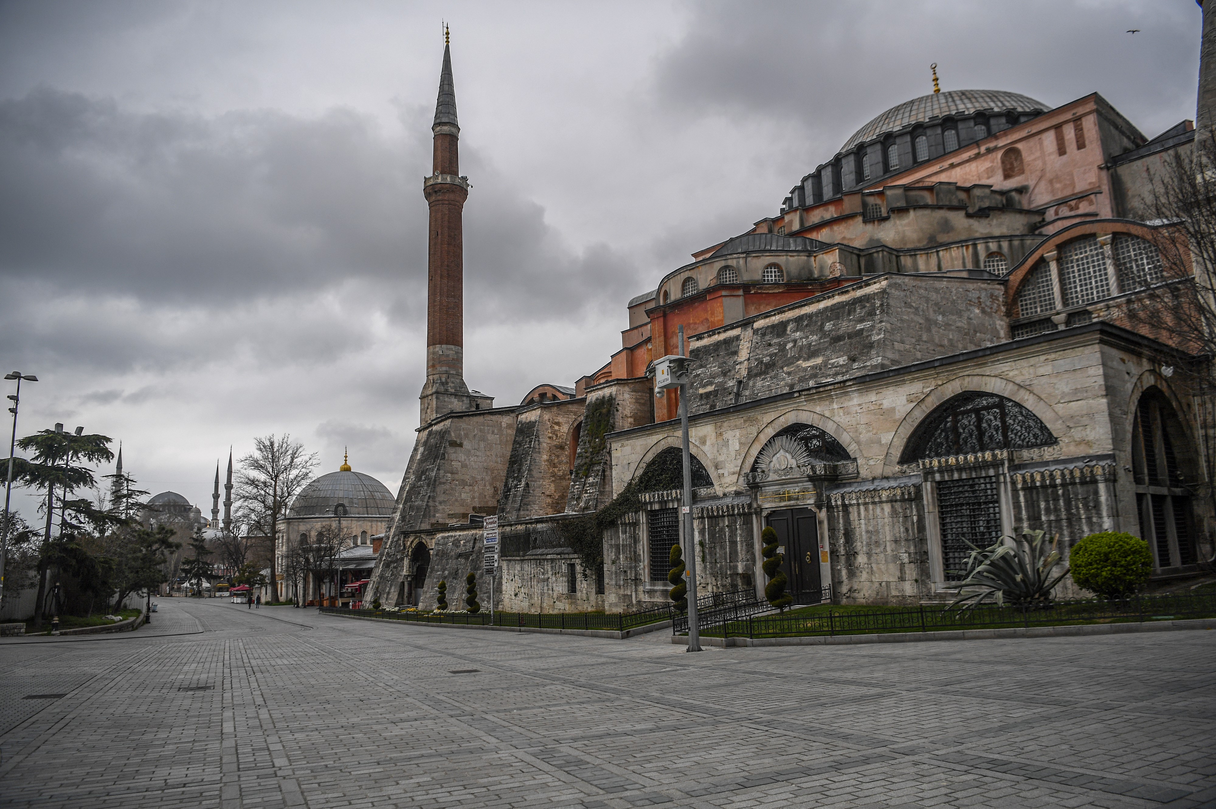 A picture taken on April 1, 2020 shows the empty streets by the iconic Hagia Sophia in Istanbul after Turkish officials have repeatedly urged citizens to stay home and respect social distancing rules. - More than 200 people have died from COVID-19 (the novel coronavirus) in Turkey, which has ramped up tests to more than 15,000 a day, Turkish Health Minister announced on March 31, 2020. (Photo by OZAN KOSE/AFP via Getty Images)